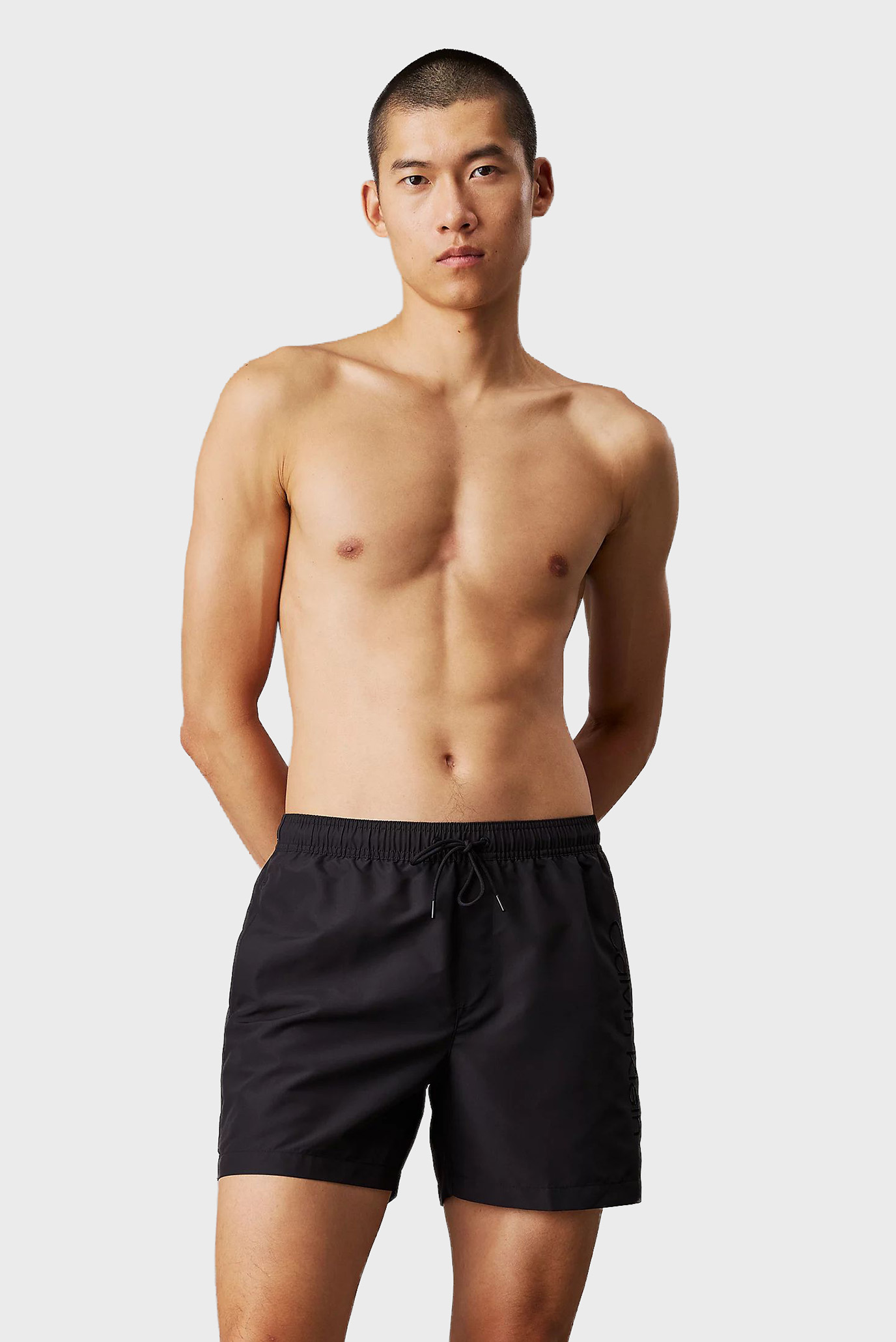 Мужские черные плавательные шорты MEDIUM DRAWSTRING Черный XL Calvin Klein KM0KM01166 Мужские черные плавательные шорты MEDIUM DRAWSTRING Черный XL Calvin Klein KM0KM01166