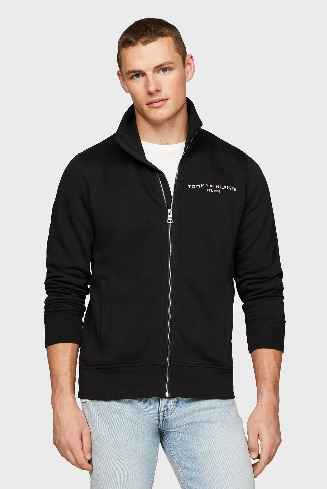 Мужская черная спортивная кофта TOMMY LOGO ZIP THRU STAND COLLAR Черный L Tommy Hilfiger MW0MW29327 Мужская черная спортивная кофта TOMMY LOGO ZIP THRU STAND COLLAR Черный L Tommy Hilfiger MW0MW29327