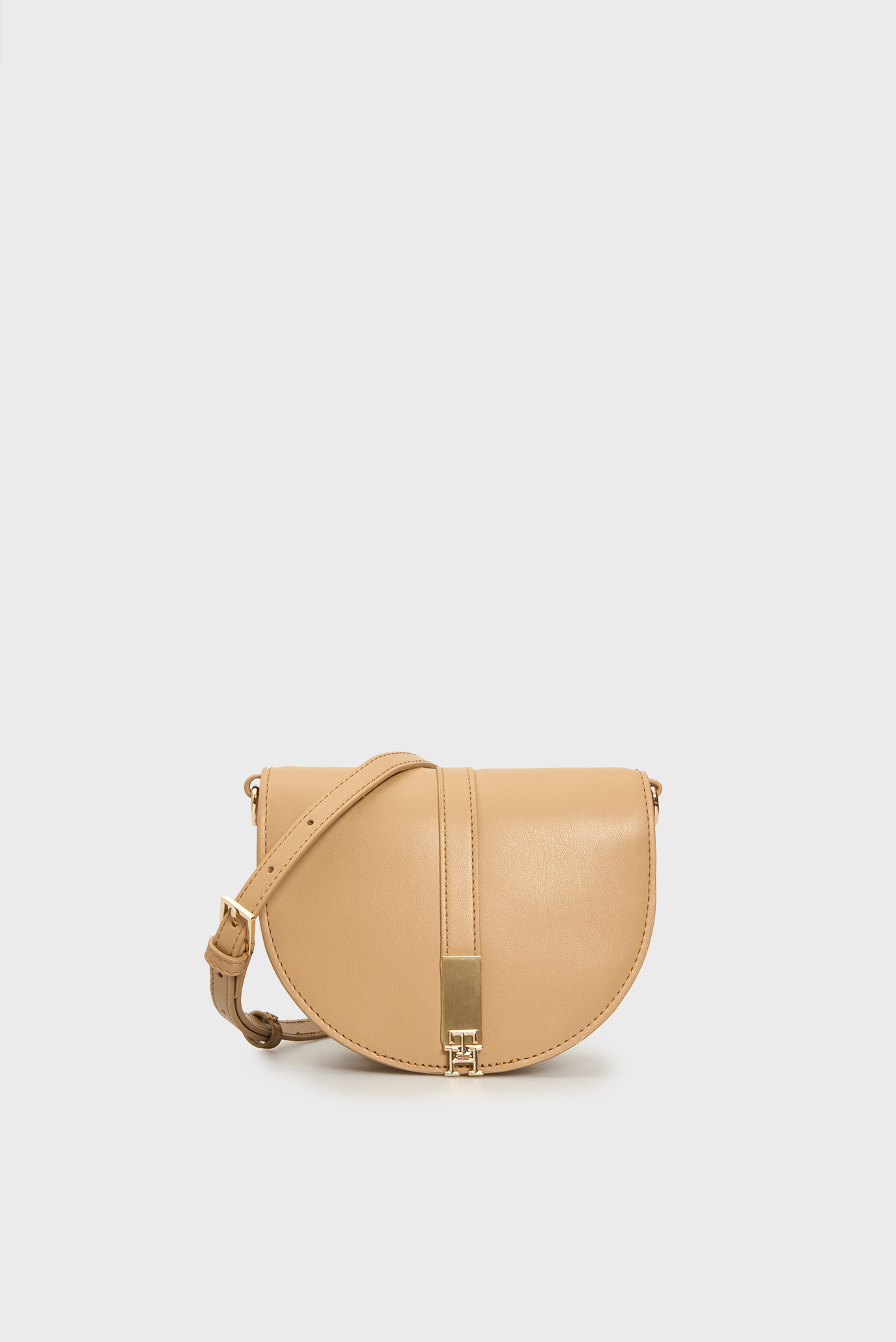 Женская бежевая сумка TH HERITAGE SADDLE BAG Бежевый ONESIZE Tommy Hilfiger AW0AW17164 Женская бежевая сумка TH HERITAGE SADDLE BAG Бежевый ONESIZE Tommy Hilfiger AW0AW17164