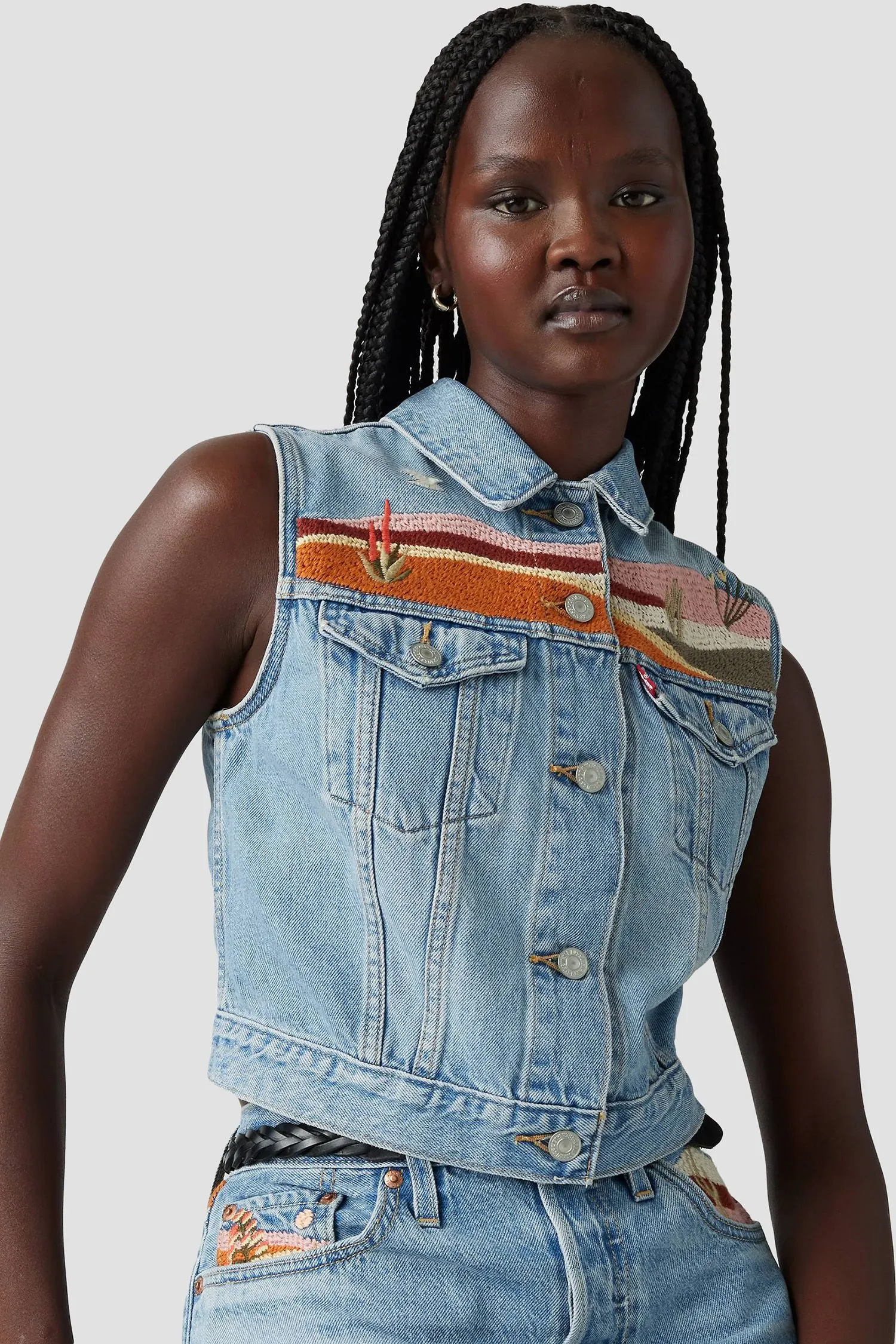 Жіночий блакитний джинсовий жилет 2