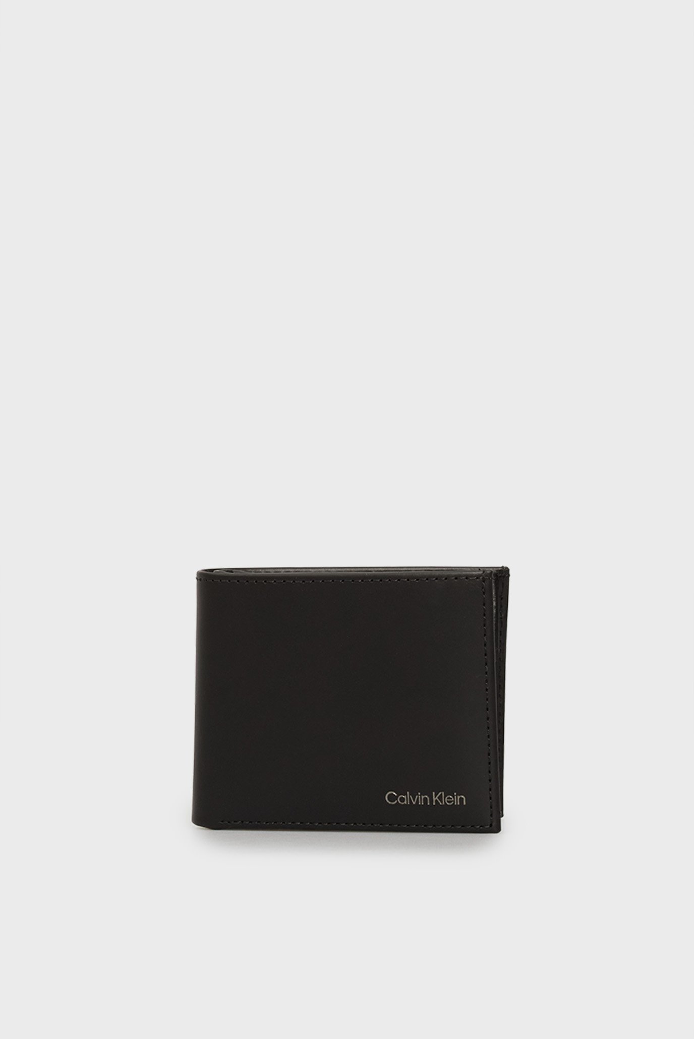 Мужской черный кожаный кошелек SMOOTH TRIFOLD Черный ONESIZE Calvin Klein LV04D1103G Мужской черный кожаный кошелек SMOOTH TRIFOLD Черный ONESIZE Calvin Klein LV04D1103G