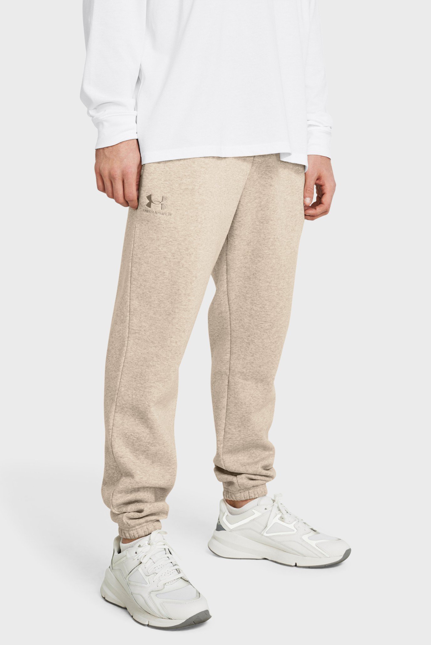 Чоловічі бежеві спортивні штани UA Essential Fleece Jogger 1