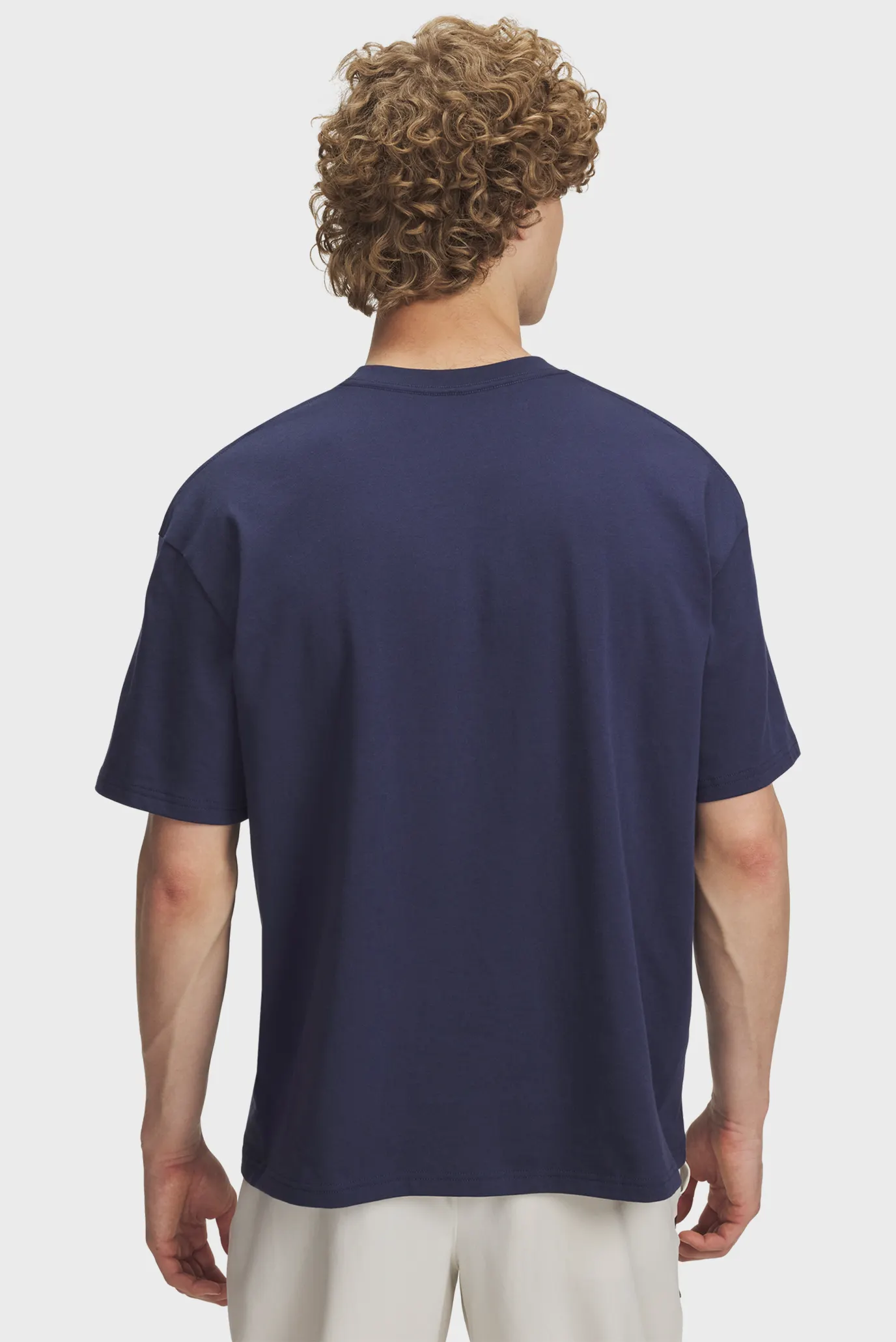 Чоловіча темно-синя футболка UA HWT WOVEN LABEL SS 3