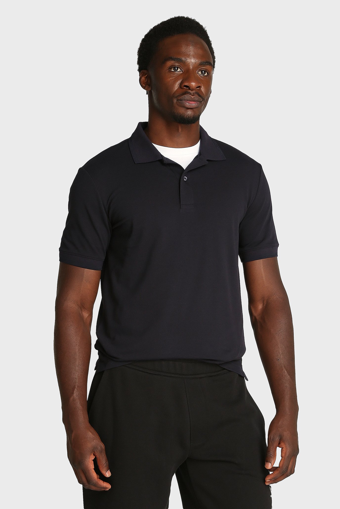 Мужское черное поло THERMO TECH PIQUE SLIM Черный L Calvin Klein K10K114484 Мужское черное поло THERMO TECH PIQUE SLIM Черный L Calvin Klein K10K114484