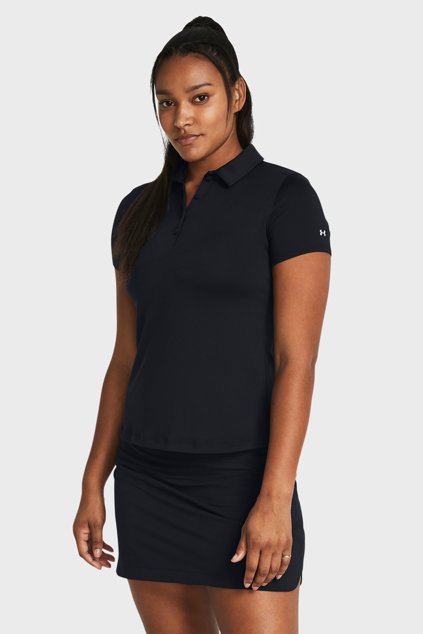 Женское черное поло UA Playoff SS Polo Черный XS Under Armour 1383612-001 Женское черное поло UA Playoff SS Polo Черный XS Under Armour 1383612-001