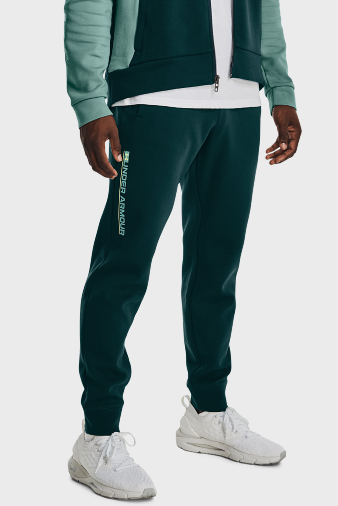 Чоловічі зелені спортивні штани UA Summit Knit Jogger 1