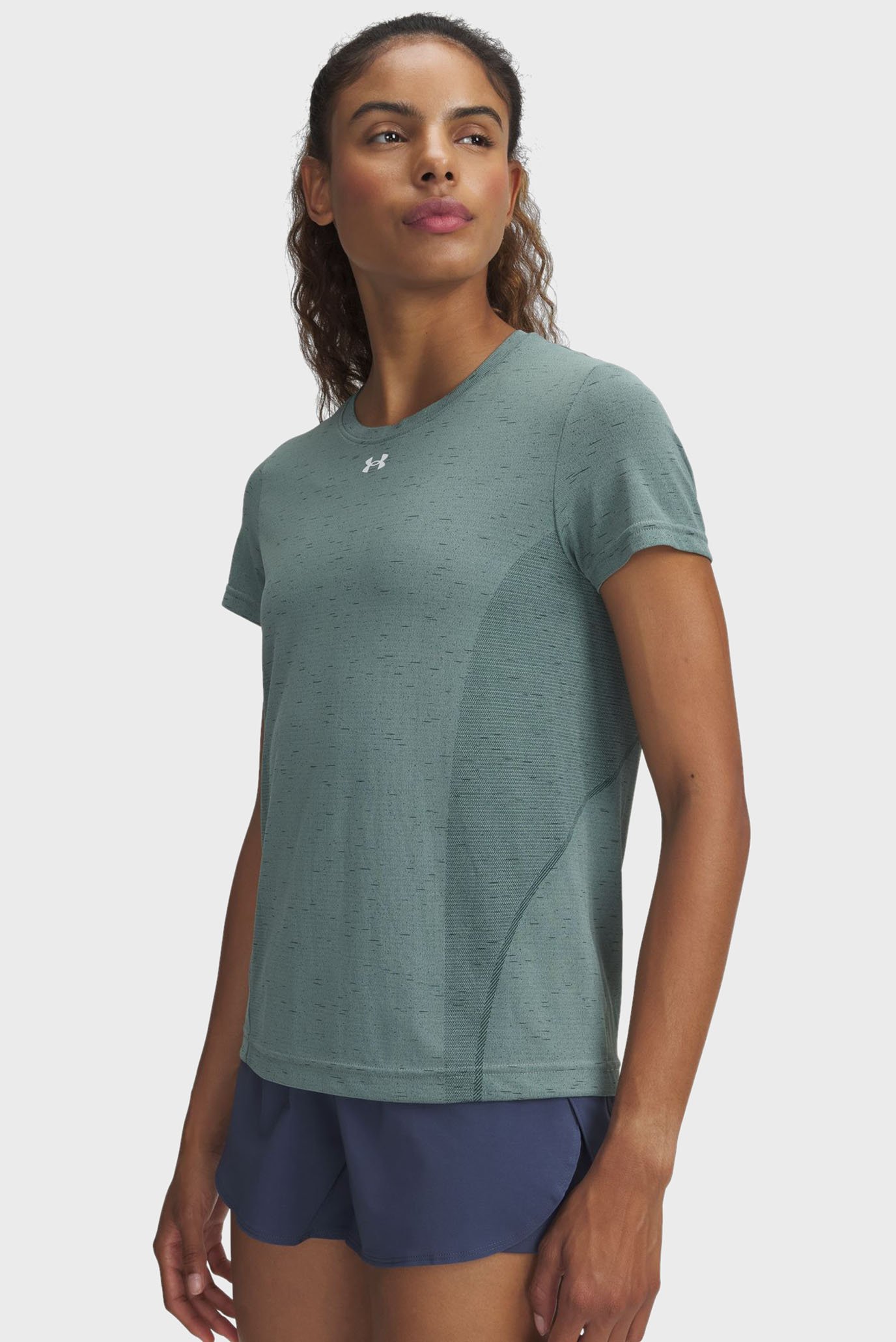 Женская мятная футболка Vanish Seamless Loose SS Ментоловый L Under Armour 1384406-348 Женская мятная футболка Vanish Seamless Loose SS Ментоловый L Under Armour 1384406-348