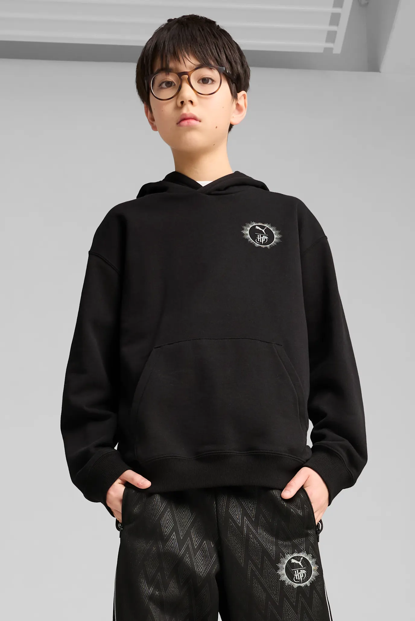 Детское черное худи PUMA x HARRY POTTER Relaxed Graphic Hoodie Youth 1