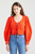 Жіноча помаранчева блуза з візерунком