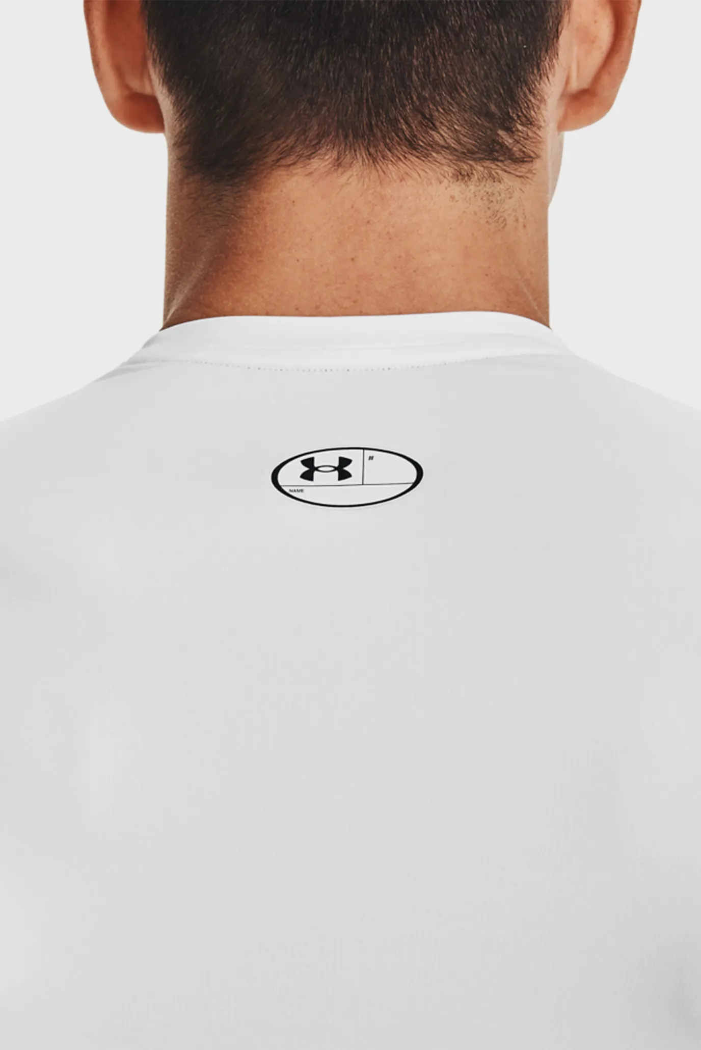 Чоловіча біла футболка UA HG Armour Comp SS-WHT 4