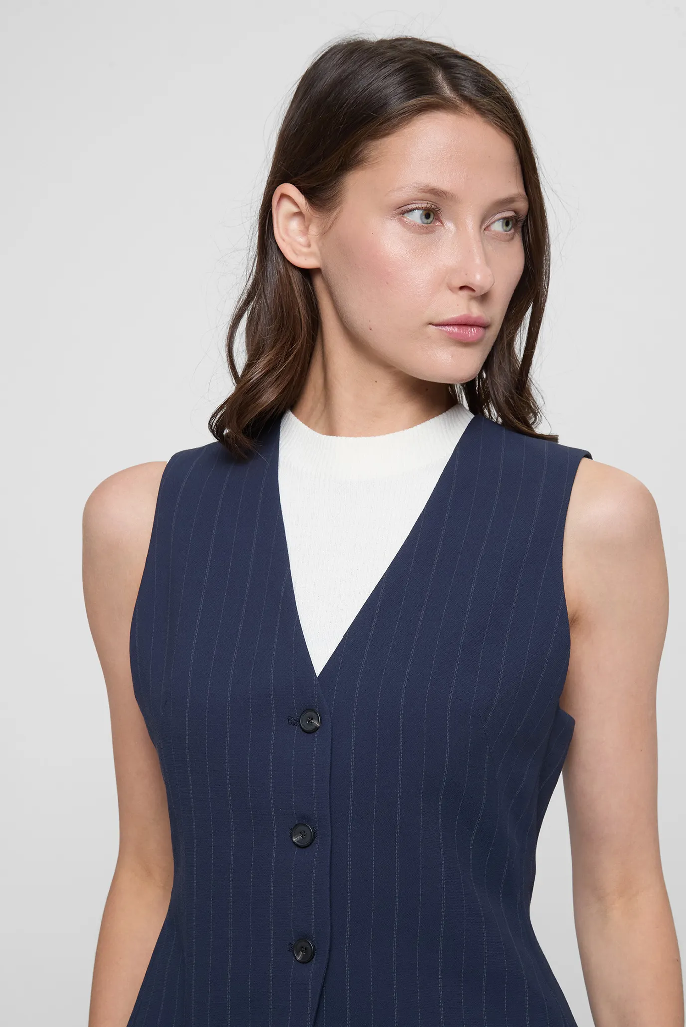 Женский темно-синий жилет в полоску 2