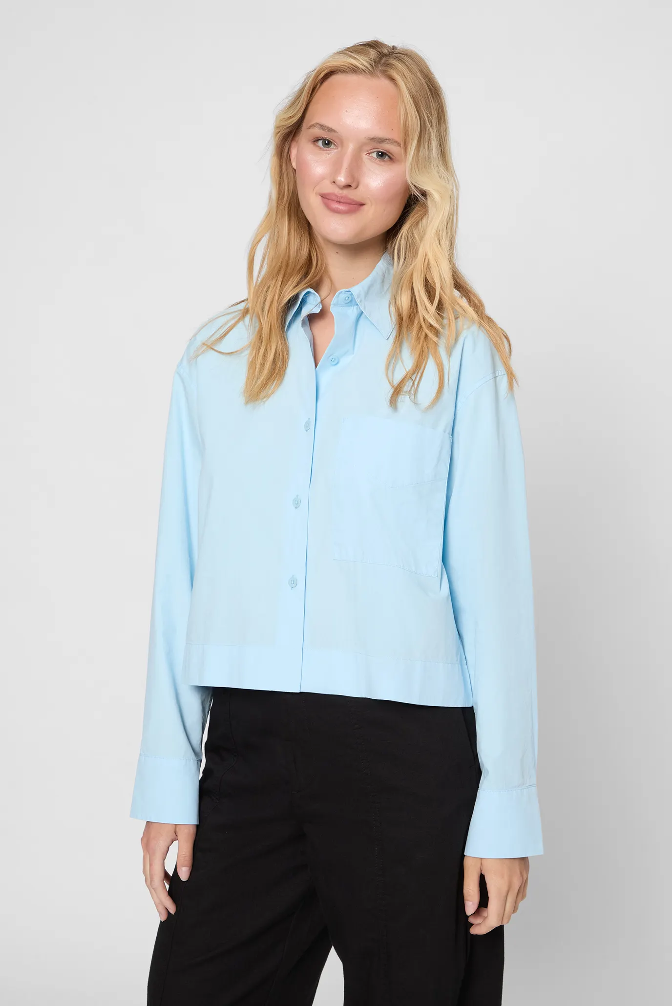 Жіноча блакитна сорочка 1