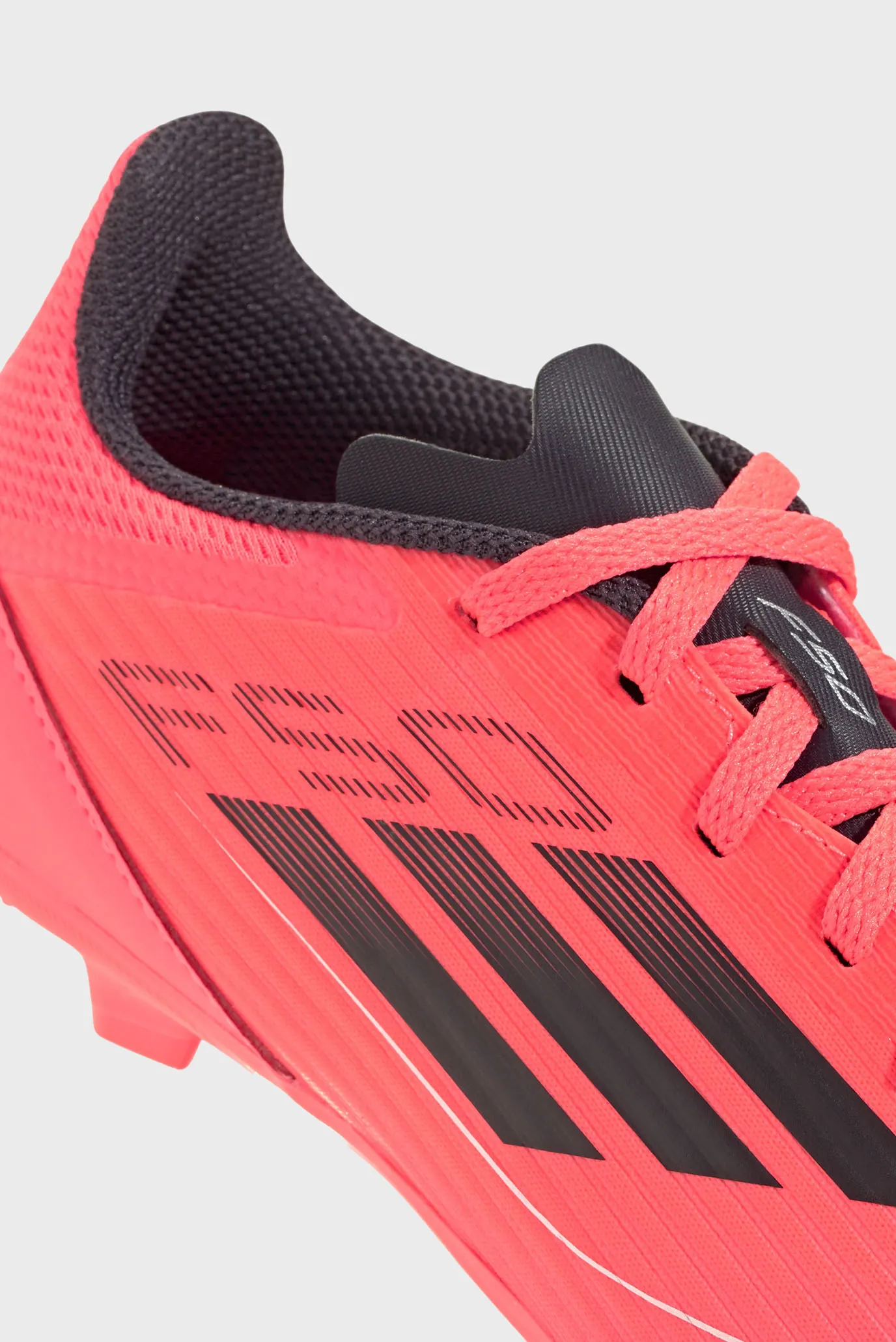 Дитячі рожеві бутси F50 League Firm/Multi-Ground 10