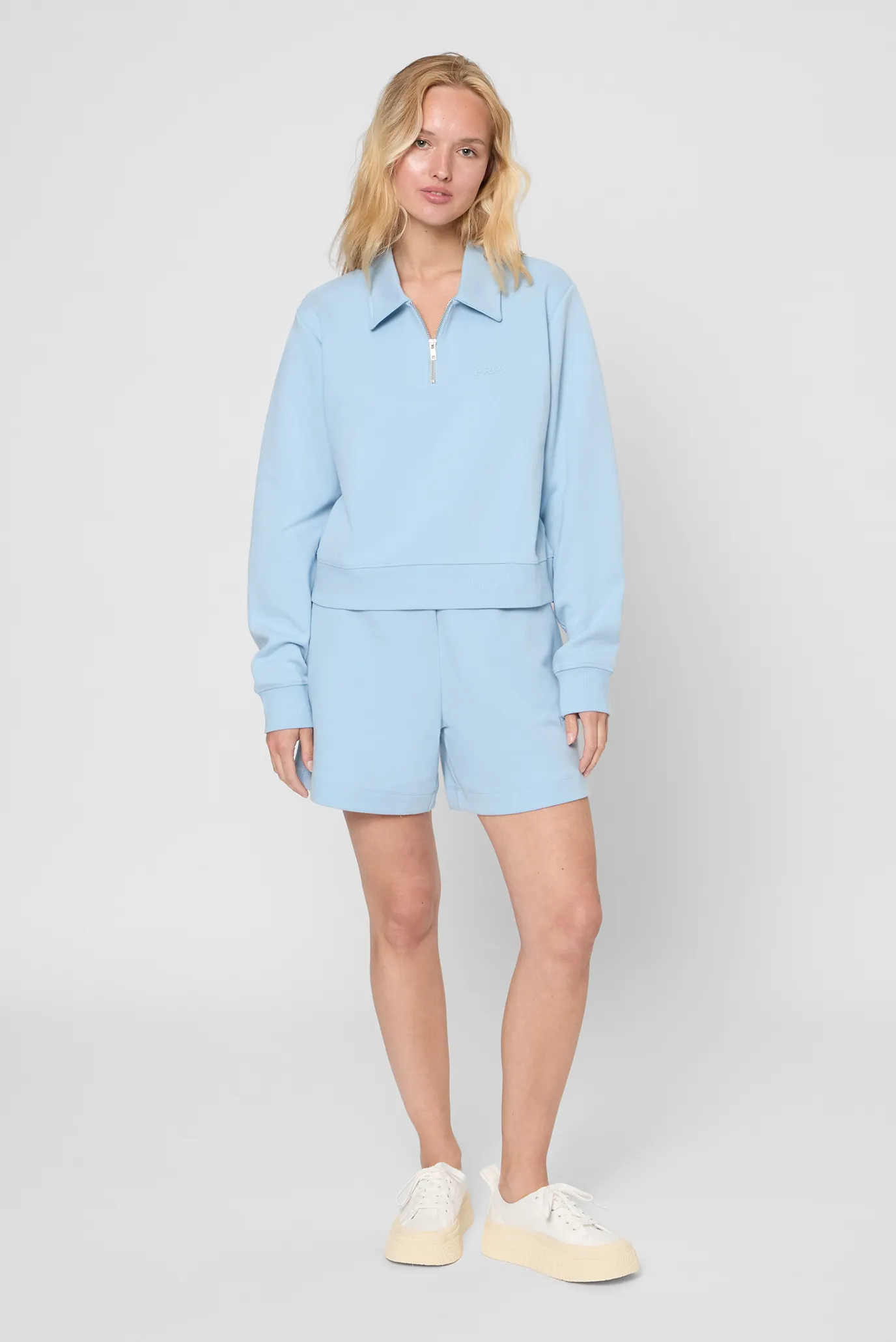 Жіноче блакитне поло 2