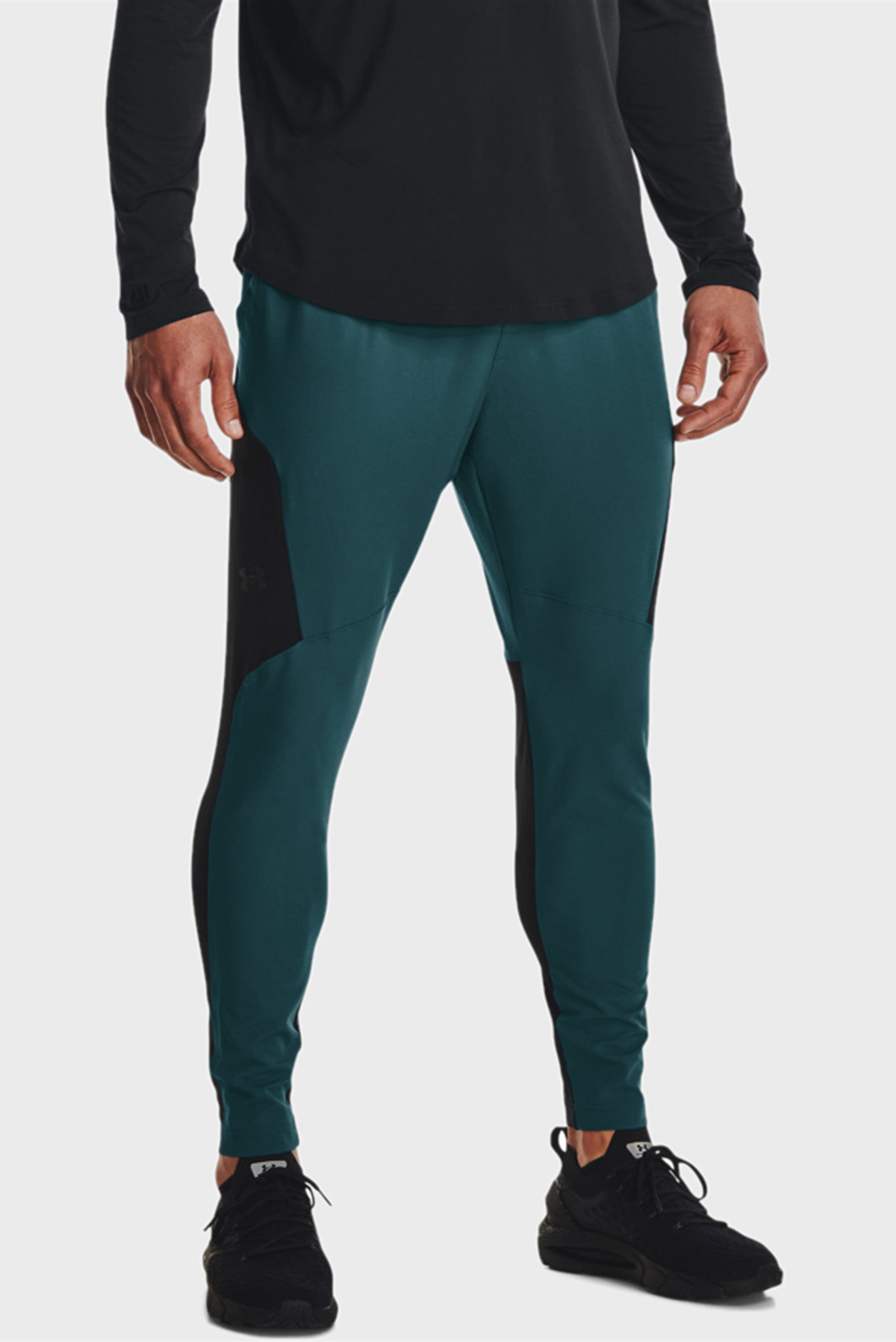 Чоловічі зелені спортивні штани UA Unstoppable Hybrid Pant 1