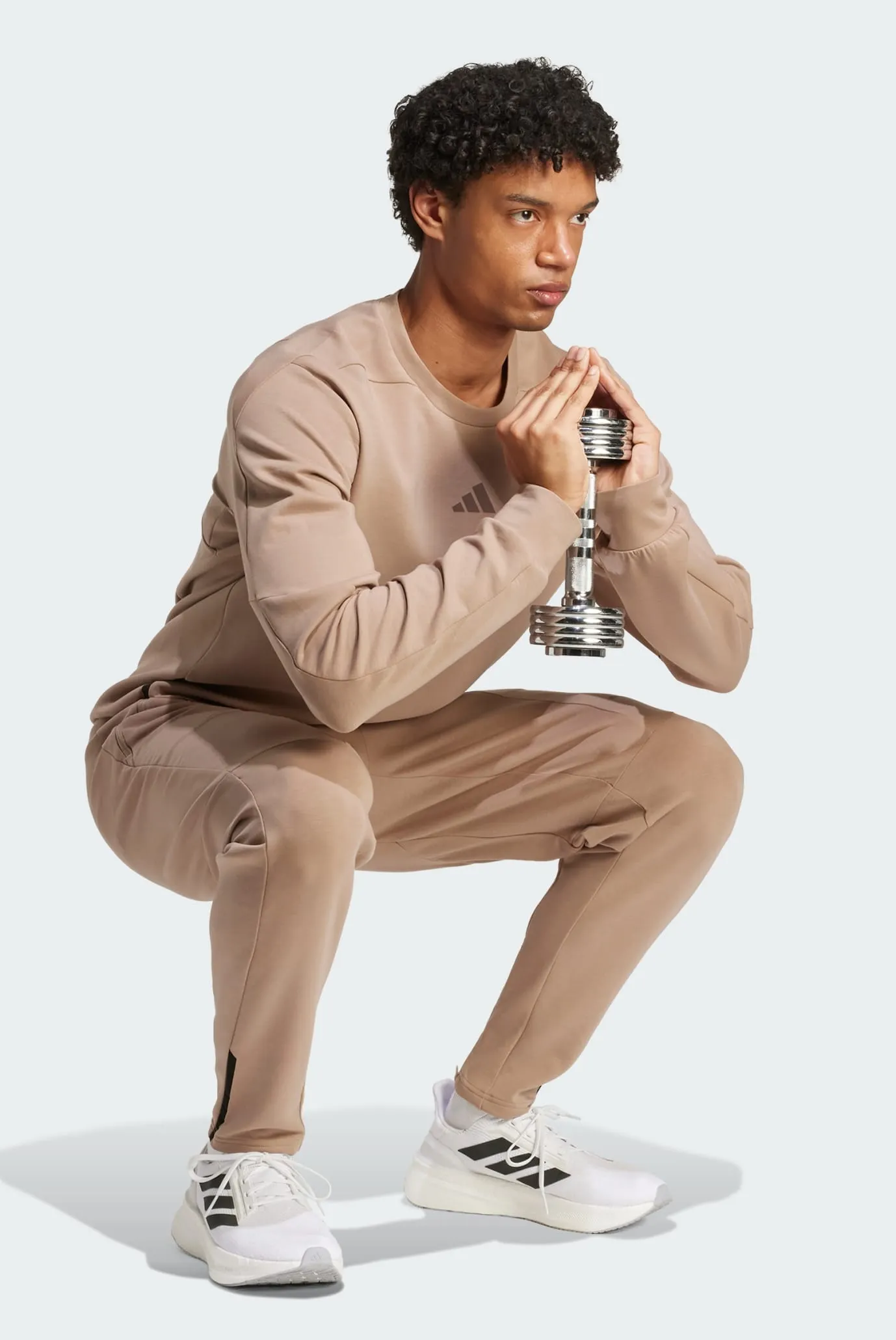 Чоловічі коричневі спортивні штани Designed for Training Spaceknit 2