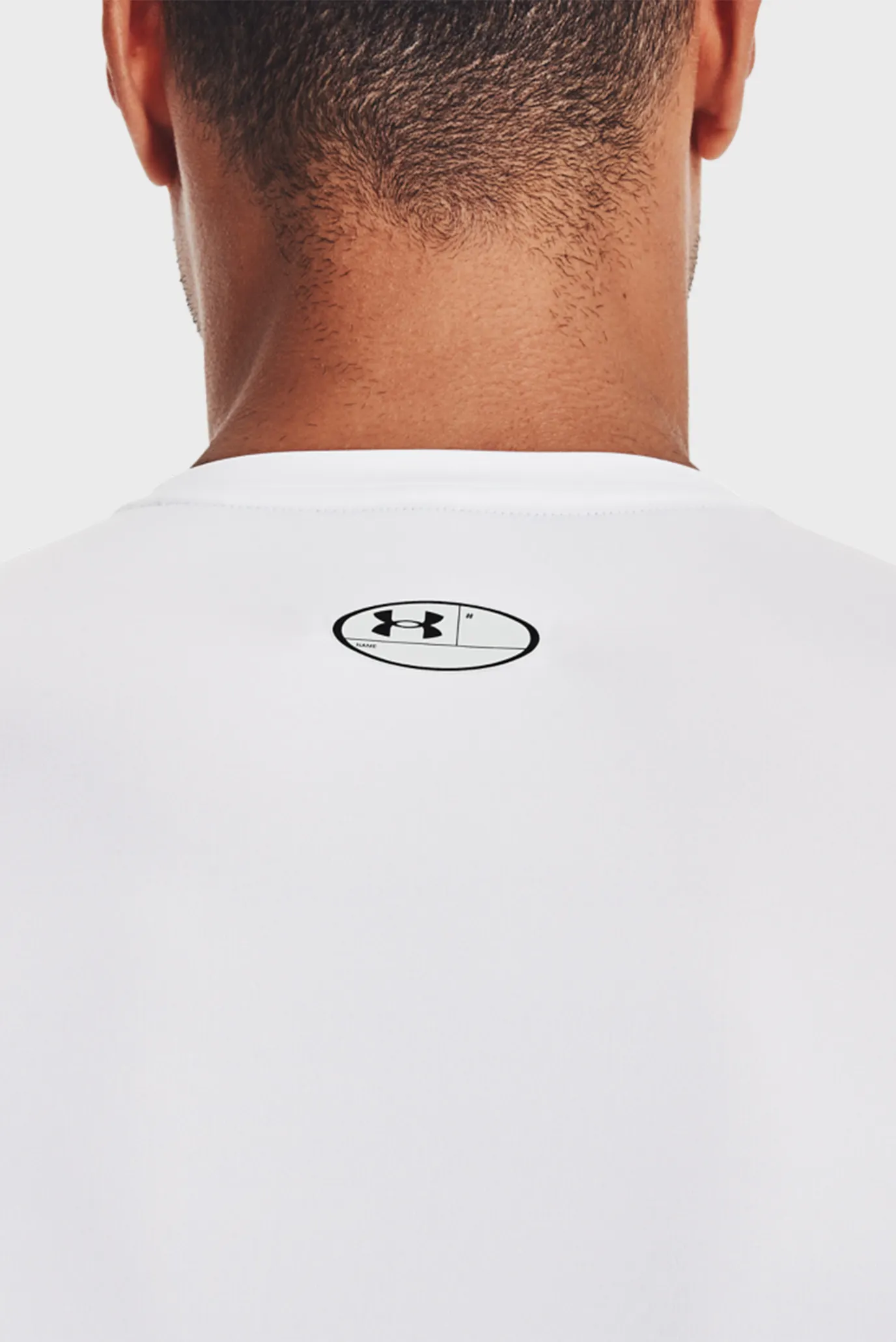 Чоловічий білий лонгслів UA HG Armour Comp 4