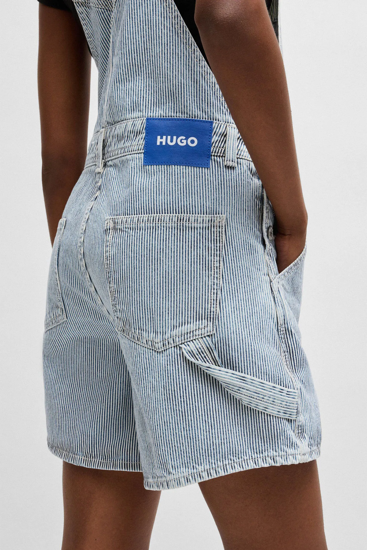 Жіночий блакитний джинсовий комбінезон у смужку 5