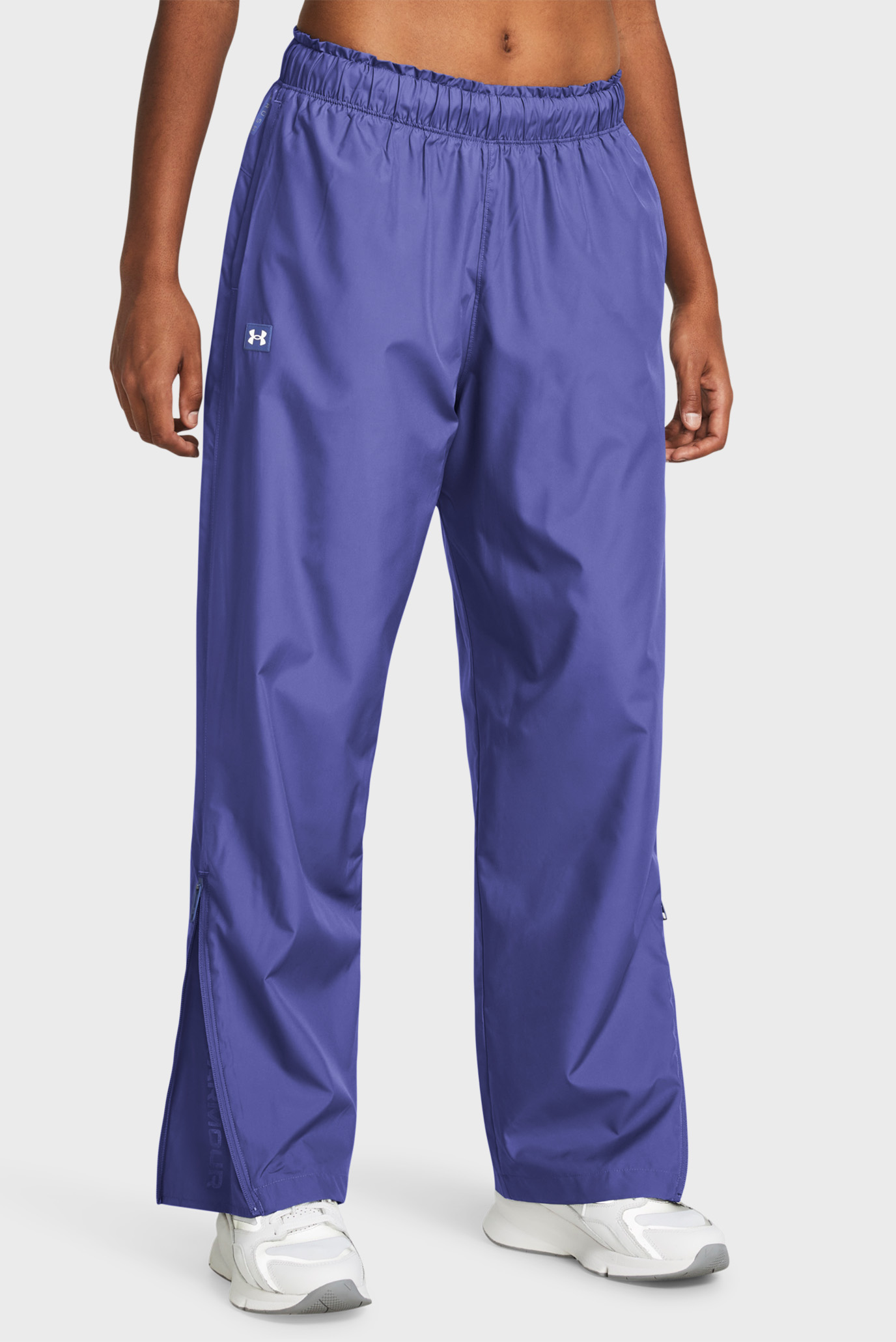 Женские фиолетовые спортивные брюки UA Rush OS Woven 1