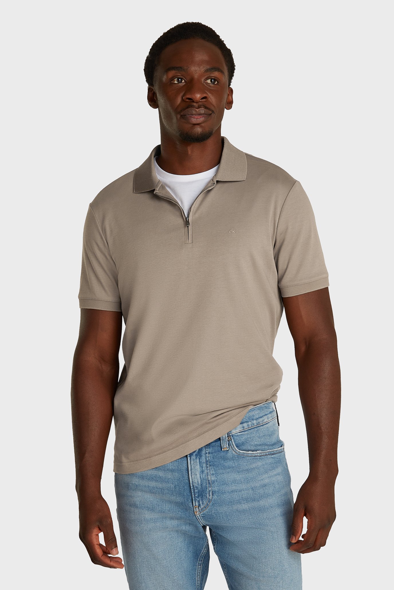 Мужское бежевое поло LIQUID TOUCH WELT ZIP Бежевый L Calvin Klein K10K112754 Мужское бежевое поло LIQUID TOUCH WELT ZIP Бежевый L Calvin Klein K10K112754