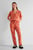 Жіноча помаранчева піжама з візерунком (сорочка, брюки)