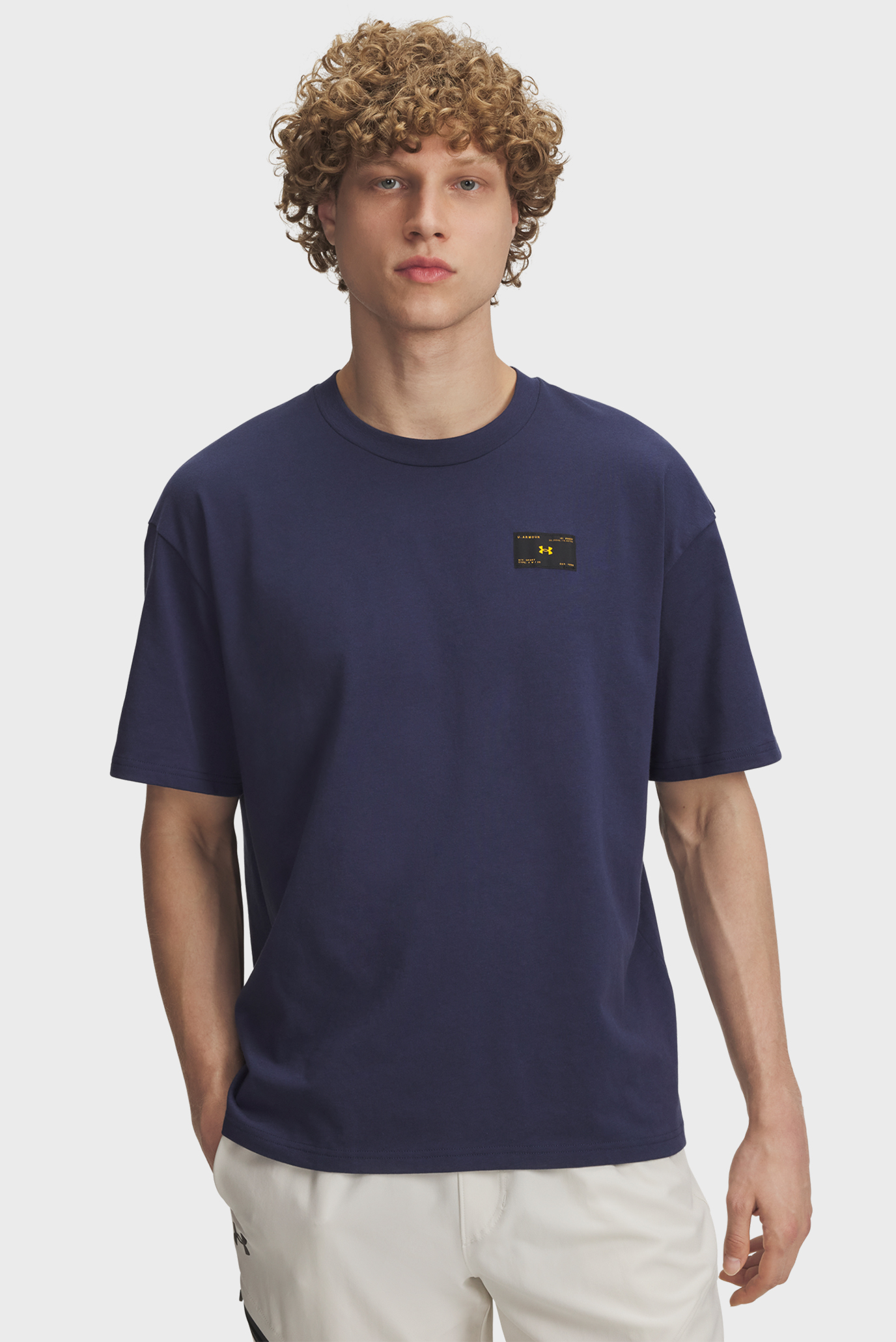 Мужская темно-синяя футболка UA HWT WOVEN LABEL SS Синий XXL Under Armour 6005668-403 Мужская темно-синяя футболка UA HWT WOVEN LABEL SS Синий XXL Under Armour 6005668-403