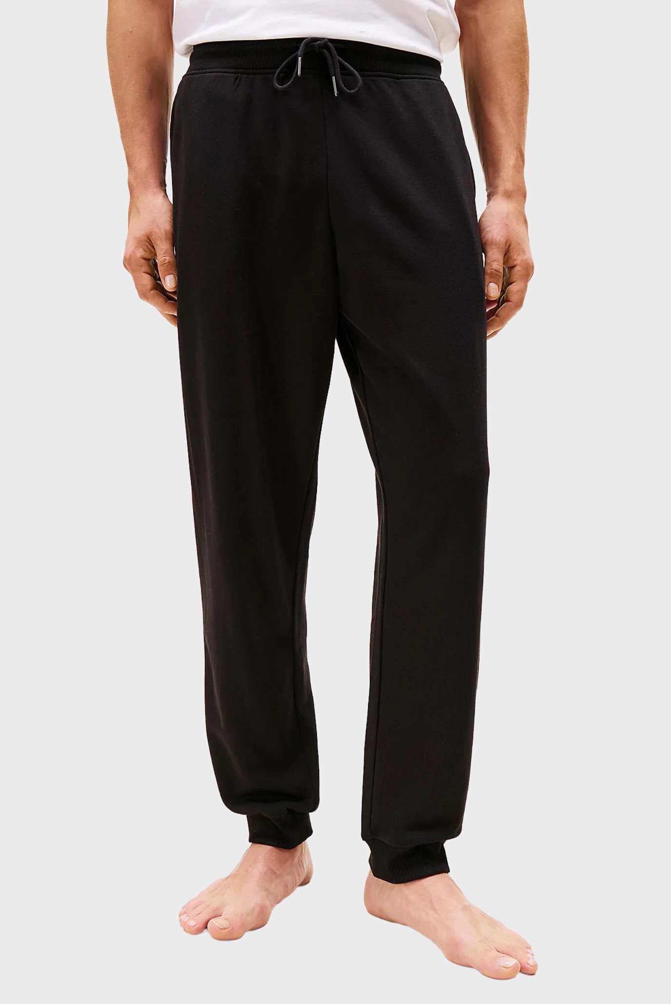Мужские черные брюки TRACK PANT Черный XXL Tommy Hilfiger UM0UM03664 Мужские черные брюки TRACK PANT Черный XXL Tommy Hilfiger UM0UM03664