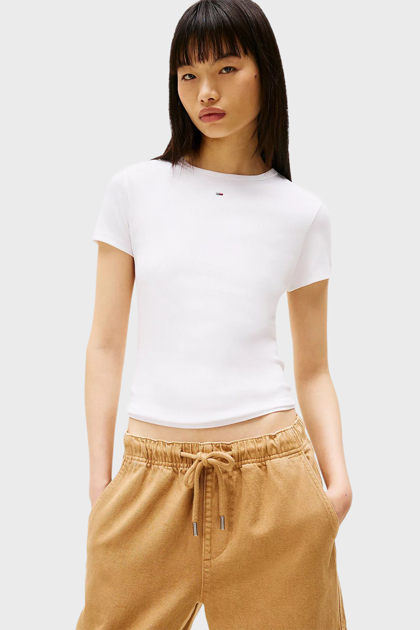Женская белая футболка TJW SLIM ESSENTIAL RIB SS EXT Белый XS Tommy Jeans DW0DW17383 Женская белая футболка TJW SLIM ESSENTIAL RIB SS EXT Белый XS Tommy Jeans DW0DW17383