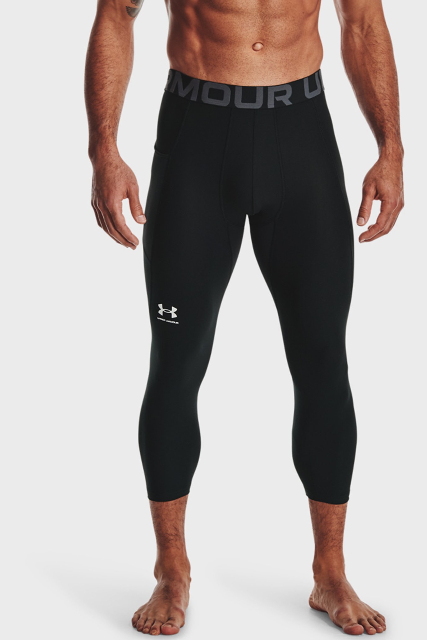 Чоловічі чорні тайтси UA HG Armour 3/4 Legging 1