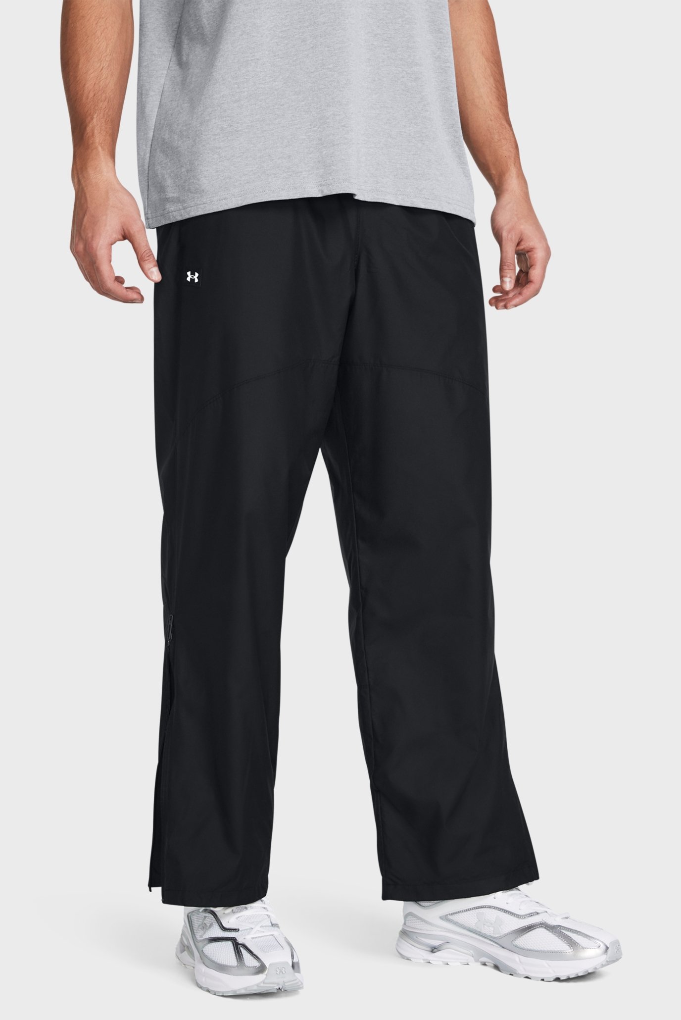 Мужские черные спортивные брюки UA Rush Woven Pants 1