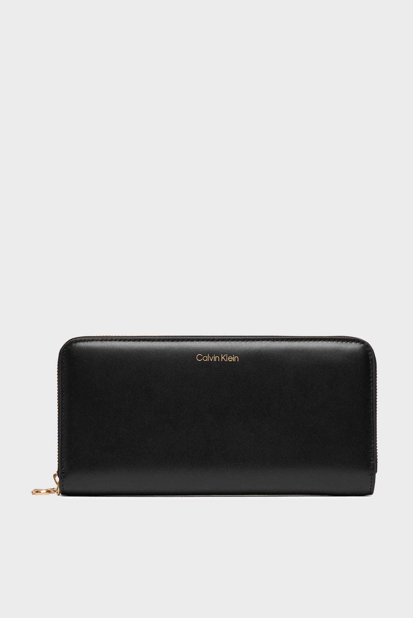Женский черный кожаный кошелек LARGE ZIP Черный ONESIZE Calvin Klein LV04F1093G Женский черный кожаный кошелек LARGE ZIP Черный ONESIZE Calvin Klein LV04F1093G