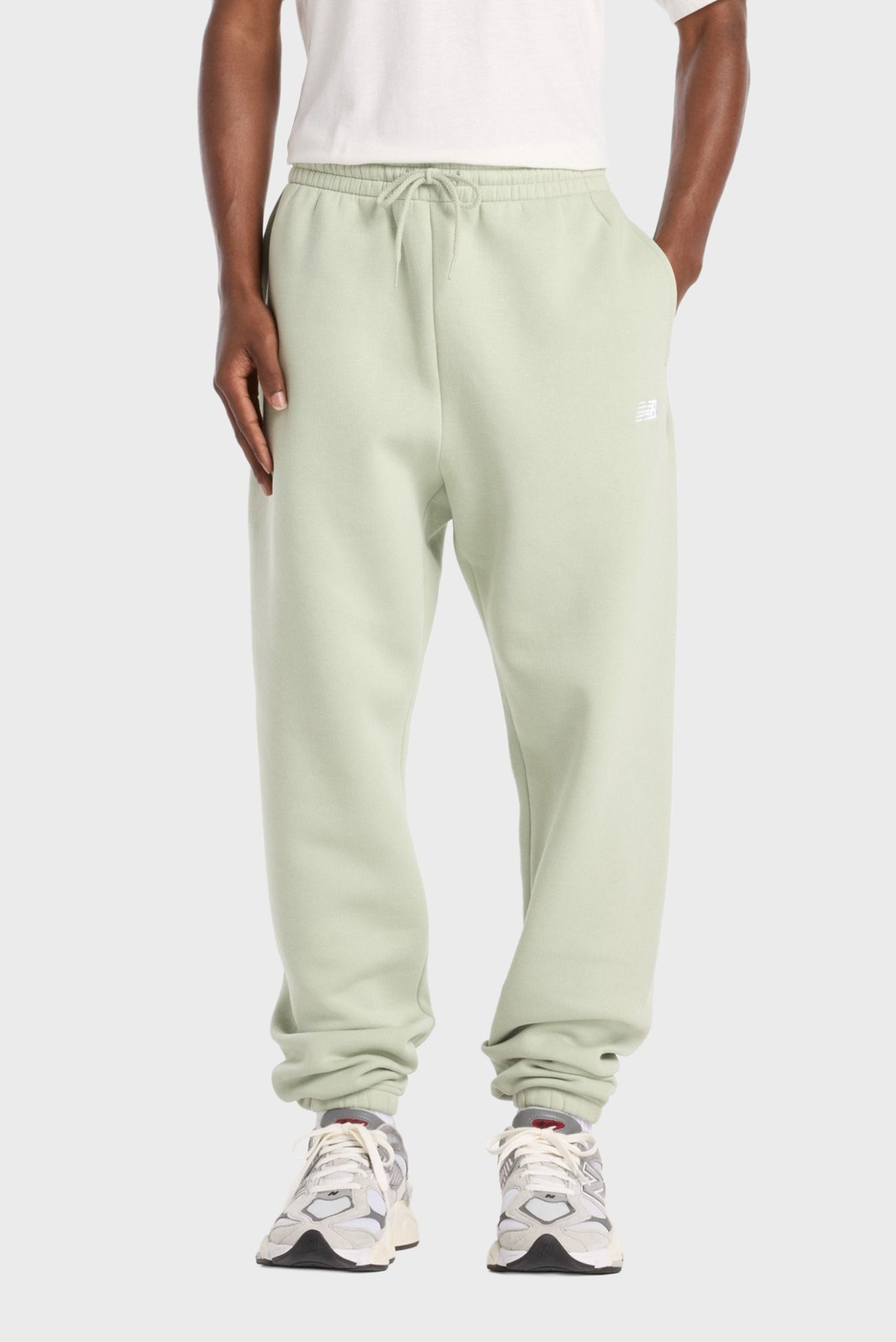 Мужские мятные спортивные брюки ESSENTIALS Ментоловый L New Balance MP41503GAS Мужские мятные спортивные брюки ESSENTIALS Ментоловый L New Balance MP41503GAS