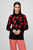 Жіночий чорний светр з візерунком
