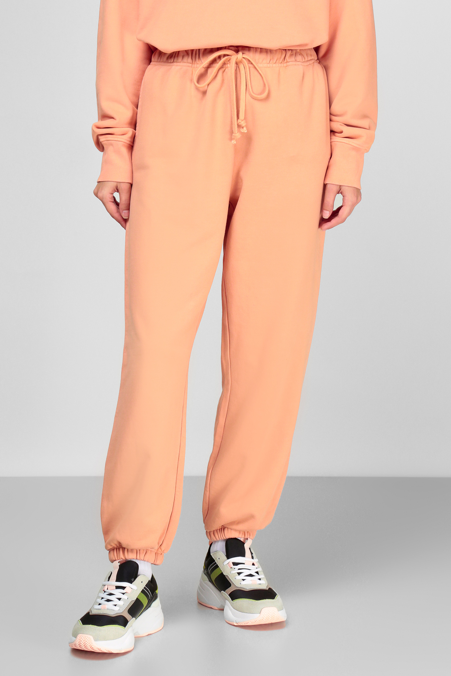 Жіночі персикові спортивні штани 1