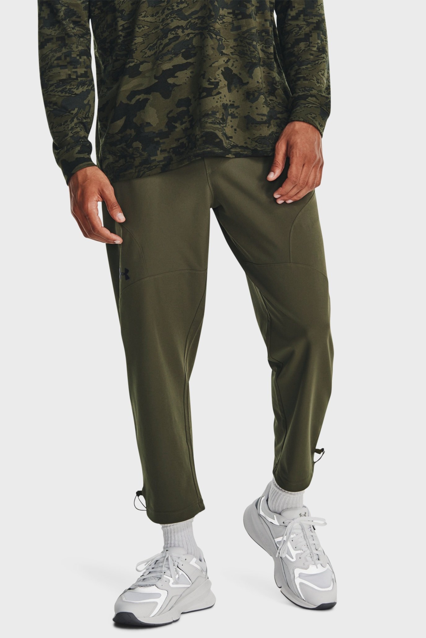 Чоловічі зелені спортивні штани UA Unstoppable Crop Pant 1