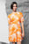 Женское оранжевое платье с узором