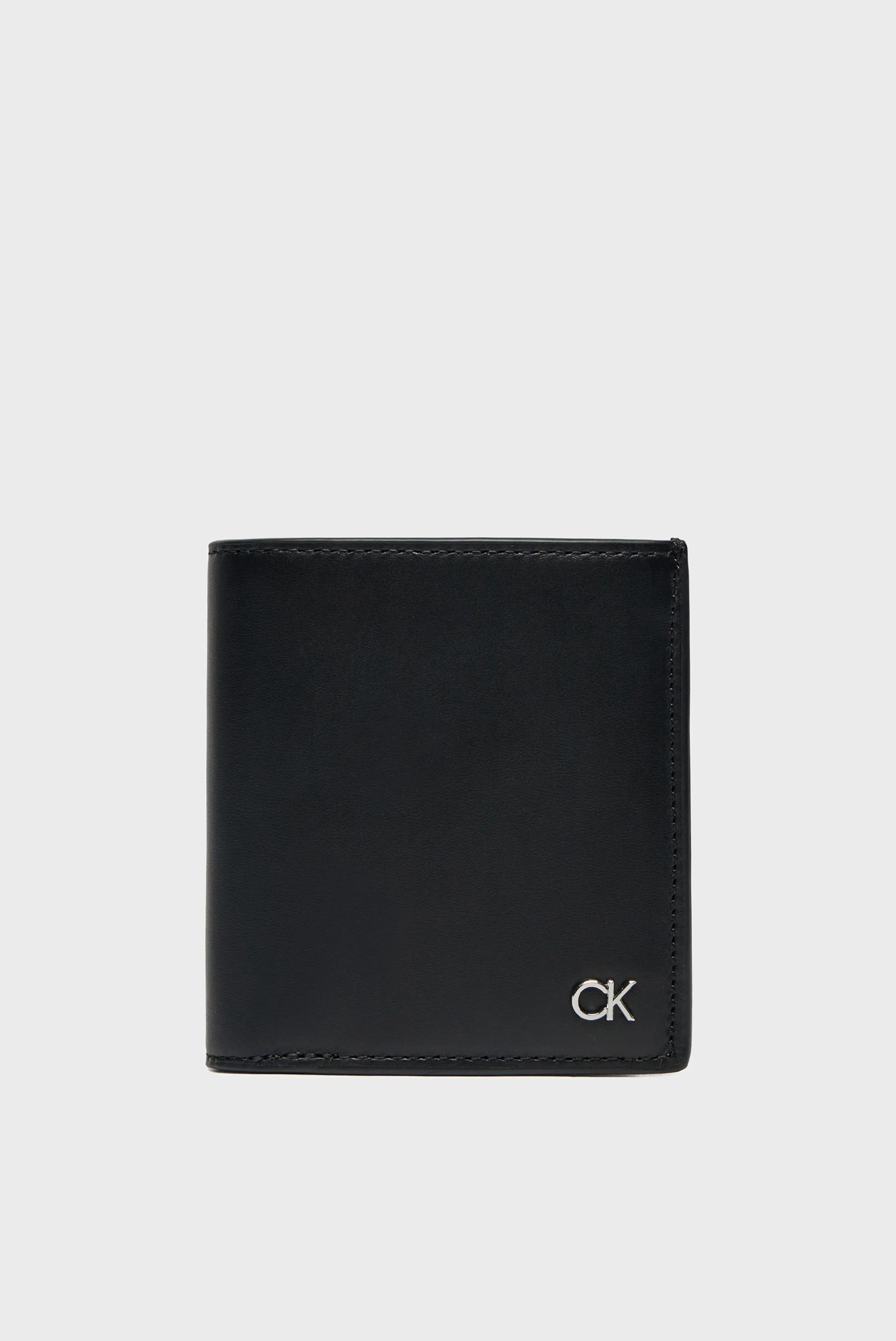 Мужской черный кожаный кошелек METAL TRIFOLD 6CC Черный ONESIZE Calvin Klein K50K512290 Мужской черный кожаный кошелек METAL TRIFOLD 6CC Черный ONESIZE Calvin Klein K50K512290