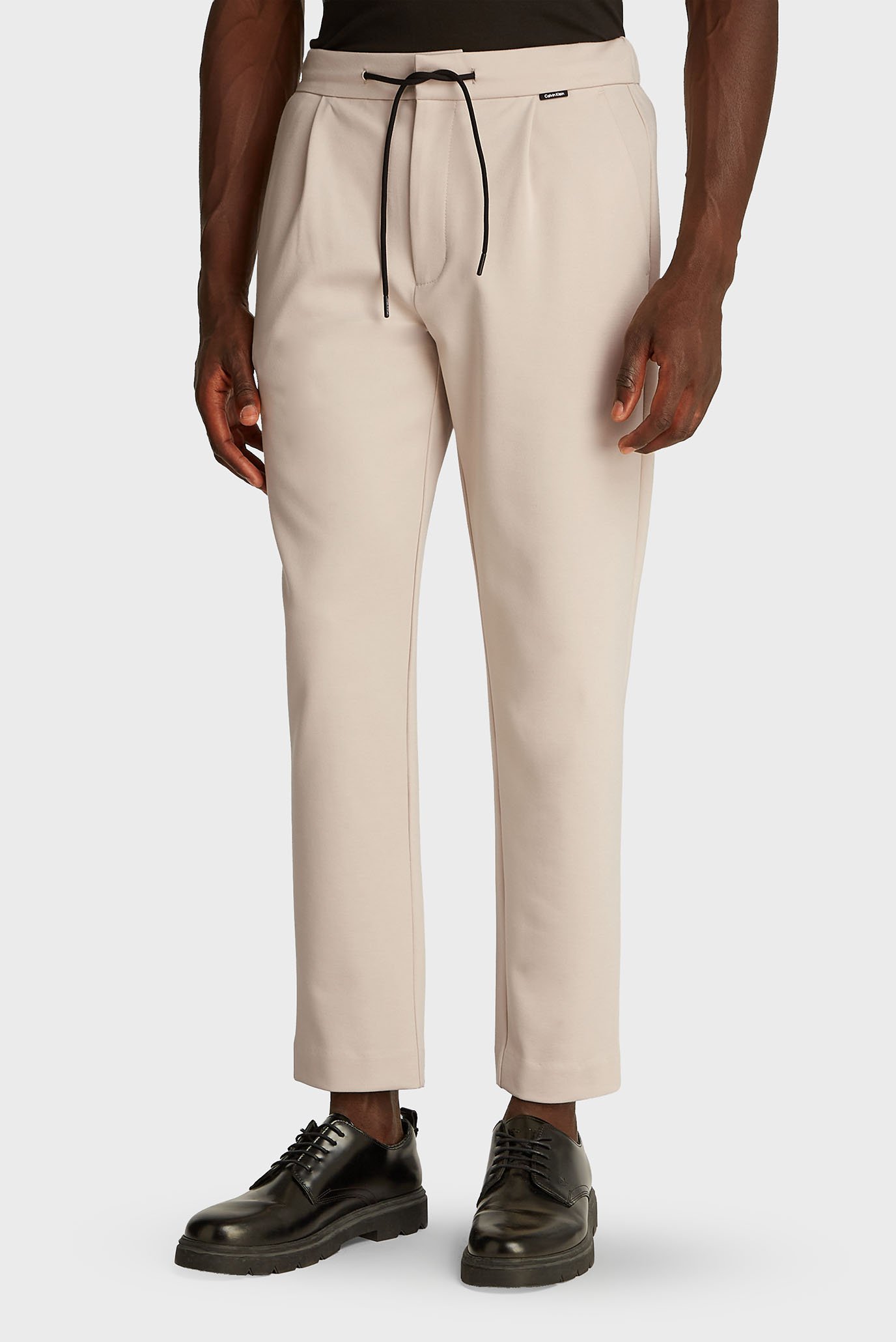 Мужские бежевые брюки Бежевый 38-32 Calvin Klein K10K113648 Мужские бежевые брюки Бежевый 38-32 Calvin Klein K10K113648