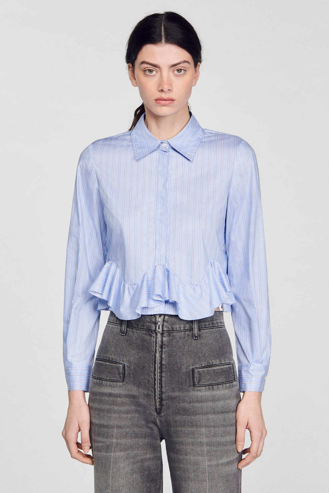 Жіноча блакитна блуза у смужку 1