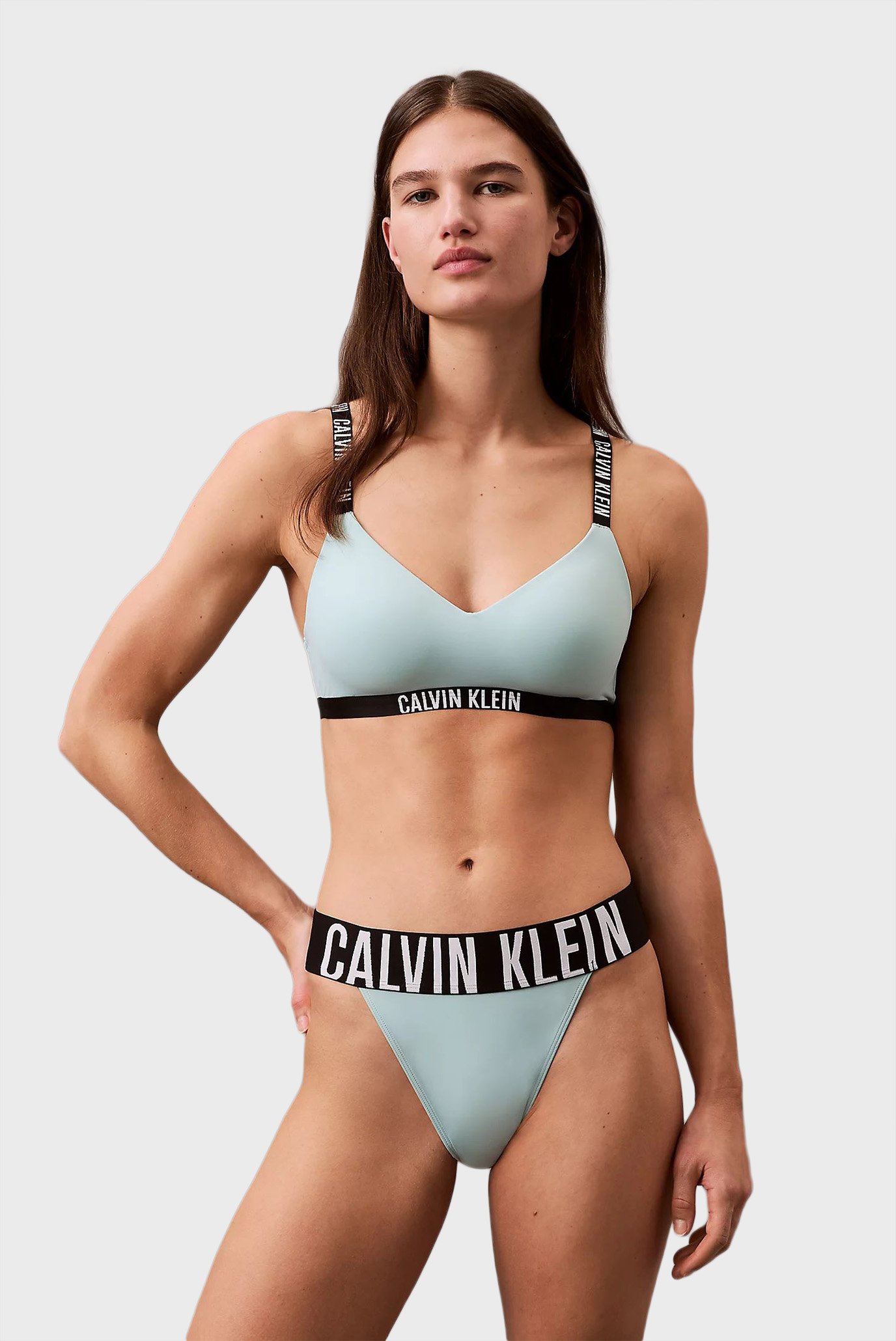 Женский голубой бюстгальтер LGHTLY LINED BRALETTE Голубой M Calvin Klein 000QF7659E Женский голубой бюстгальтер LGHTLY LINED BRALETTE Голубой M Calvin Klein 000QF7659E