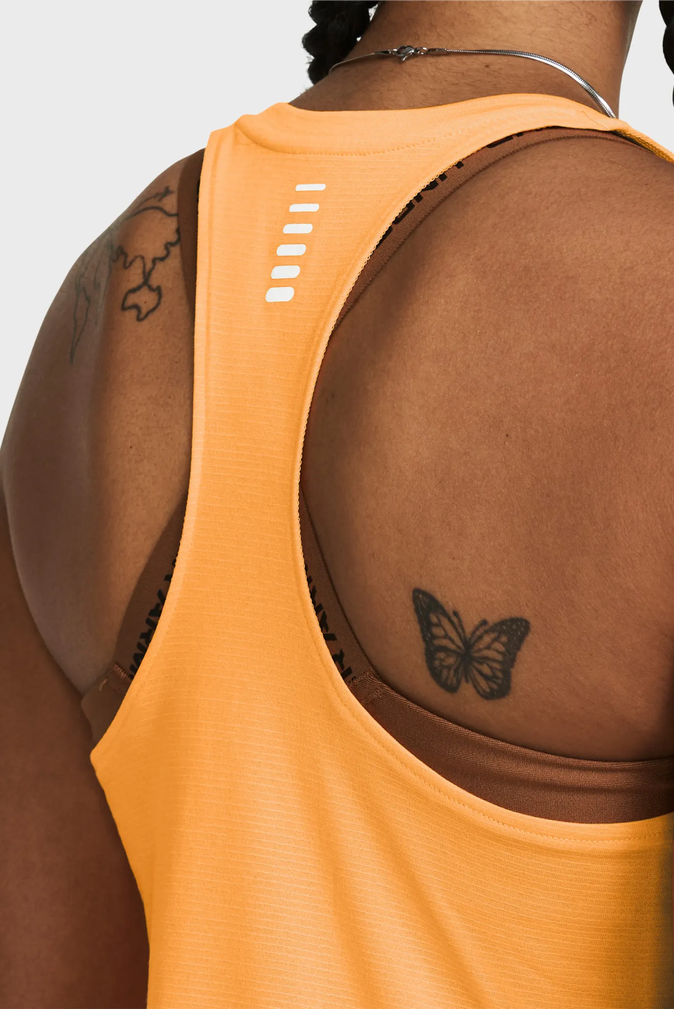 Жіноча помаранчева майка UA Launch Singlet 2