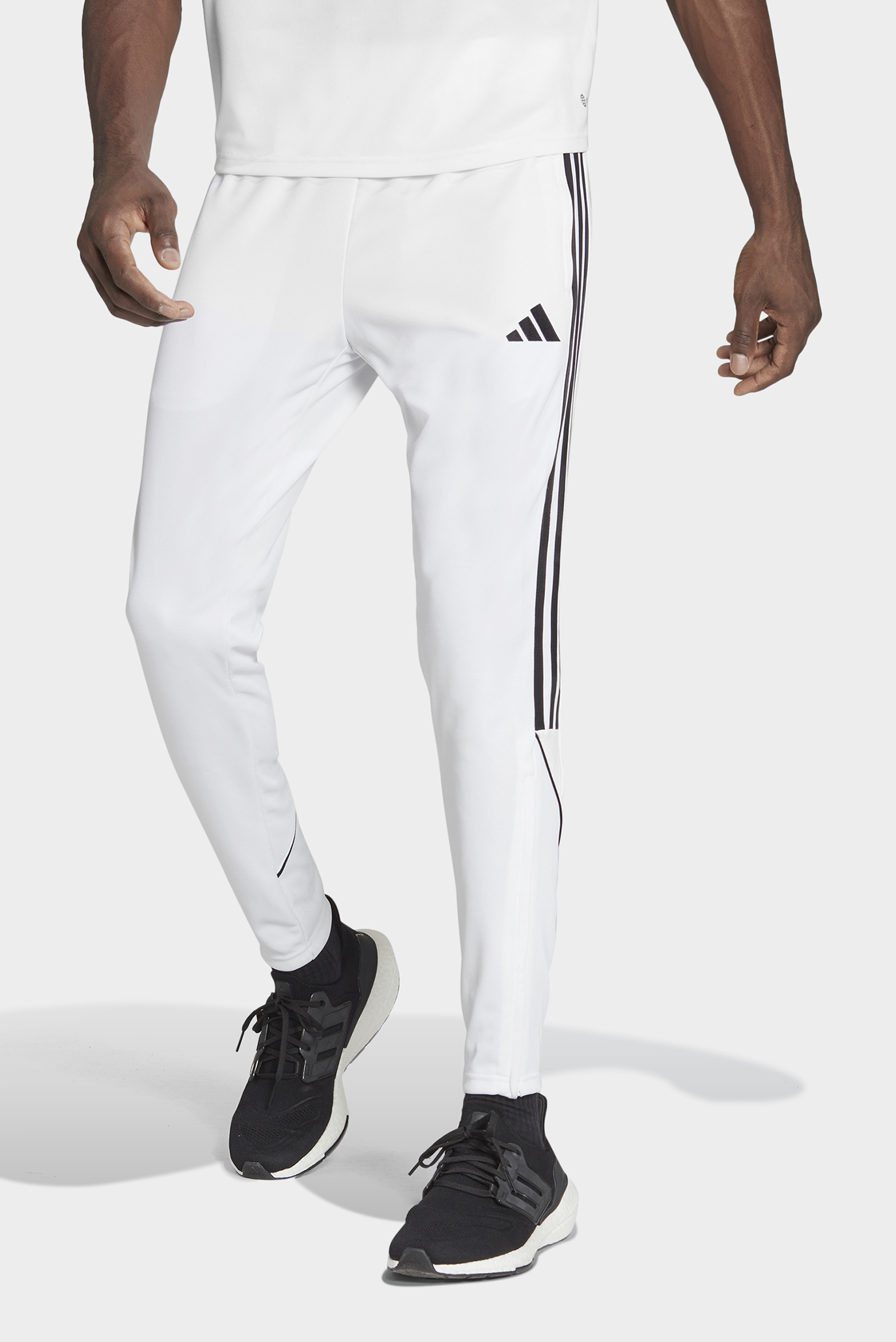Мужские белые спортивные брюки Tiro 23 League 1
