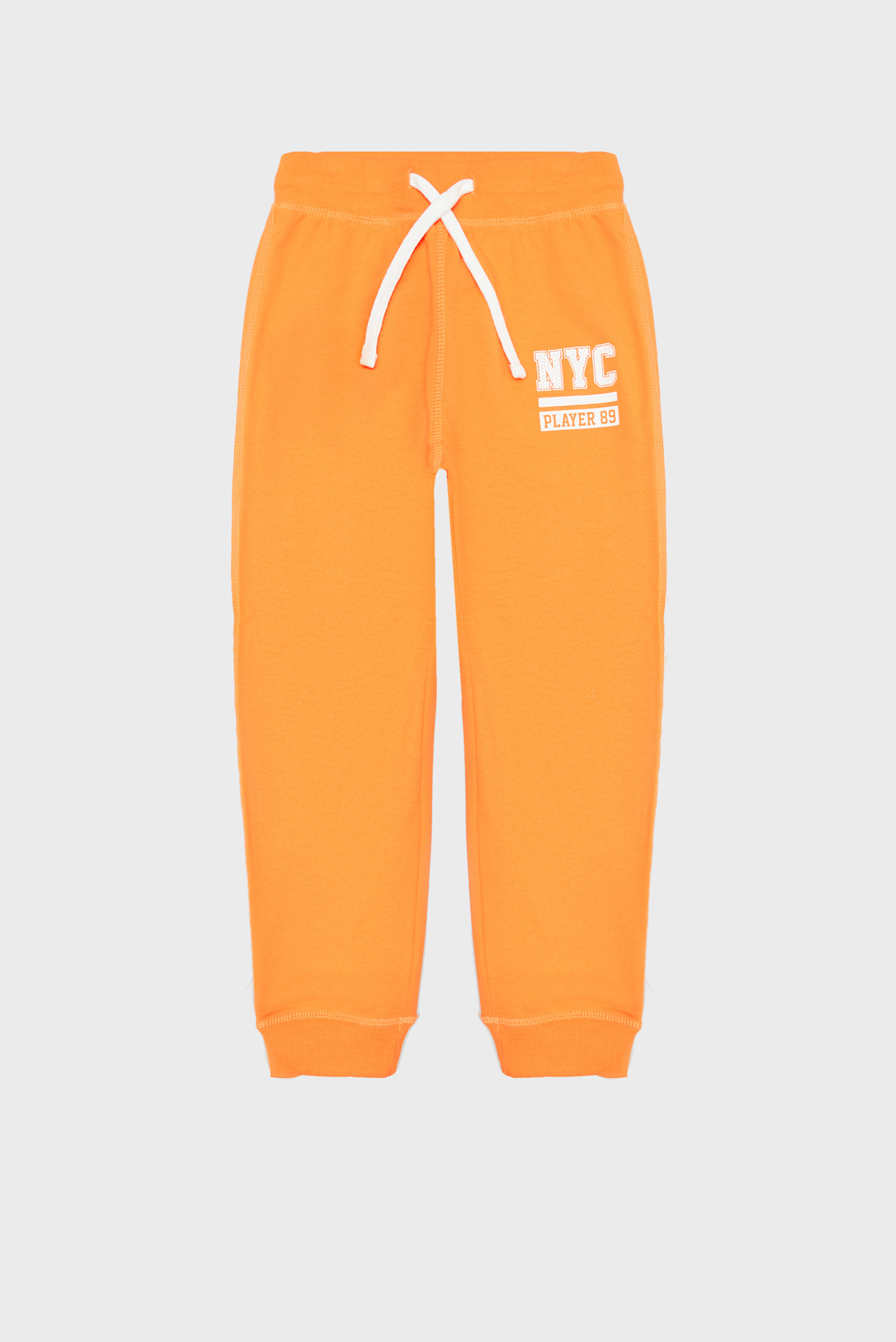 Дитячі помаранчеві спортивні штани 1