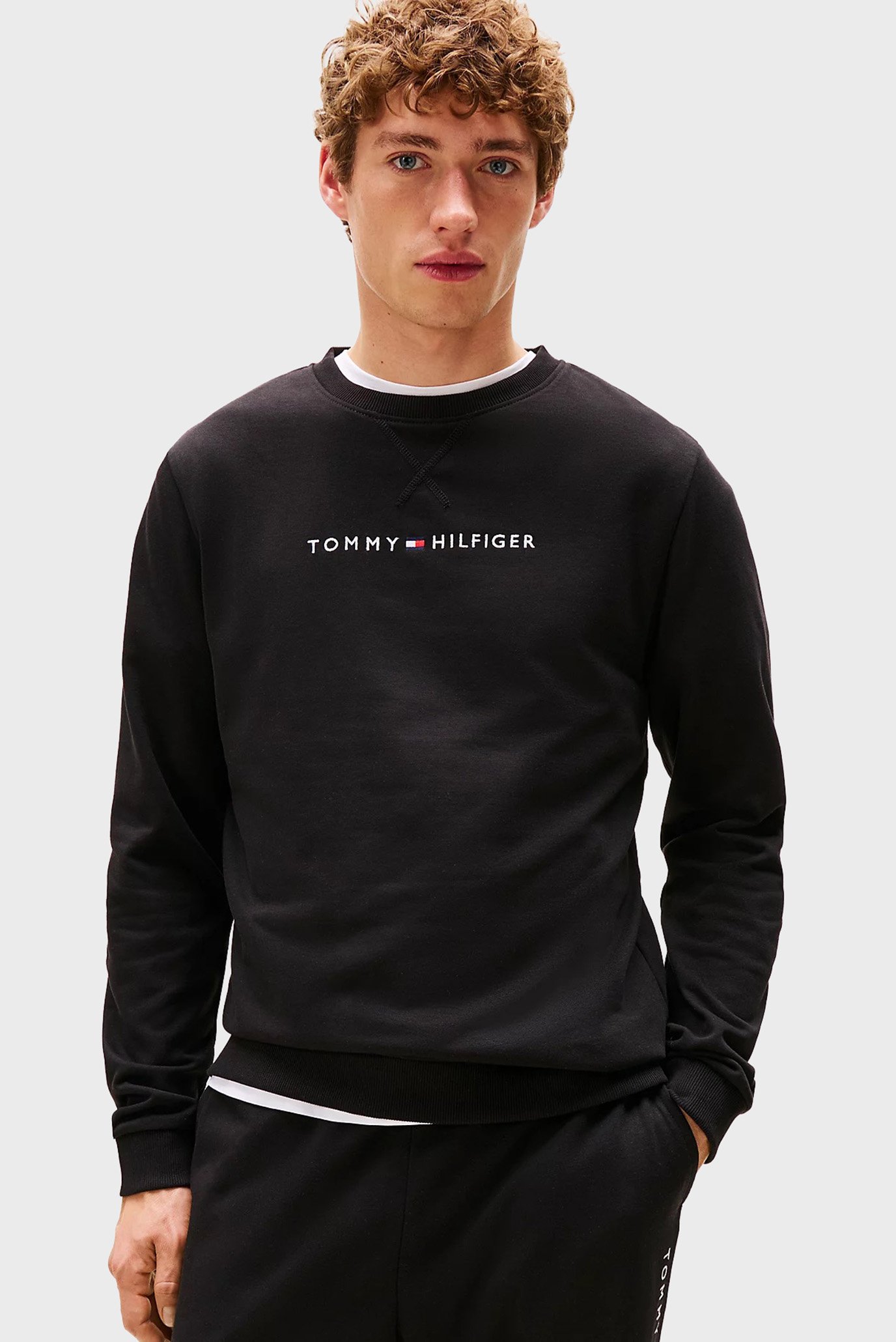 Мужской черный свитшот TRACK TOP Черный S Tommy Hilfiger UM0UM03666 Мужской черный свитшот TRACK TOP Черный S Tommy Hilfiger UM0UM03666