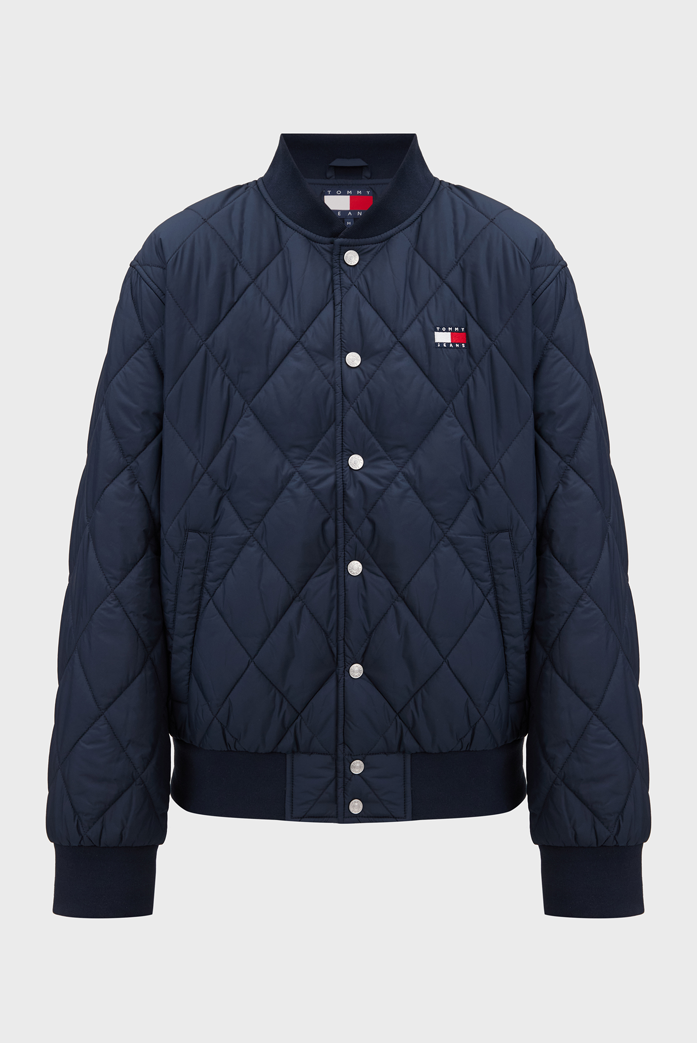 Мужской темно-синий бомбер TJM QUILTED BOMBER Синий XXL Tommy Jeans DM0DM20699 Мужской темно-синий бомбер TJM QUILTED BOMBER Синий XXL Tommy Jeans DM0DM20699