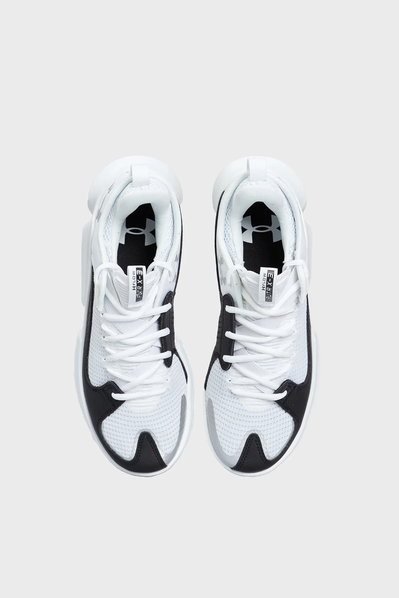 Білі кросівки UA FLOW FUTR X 3 4