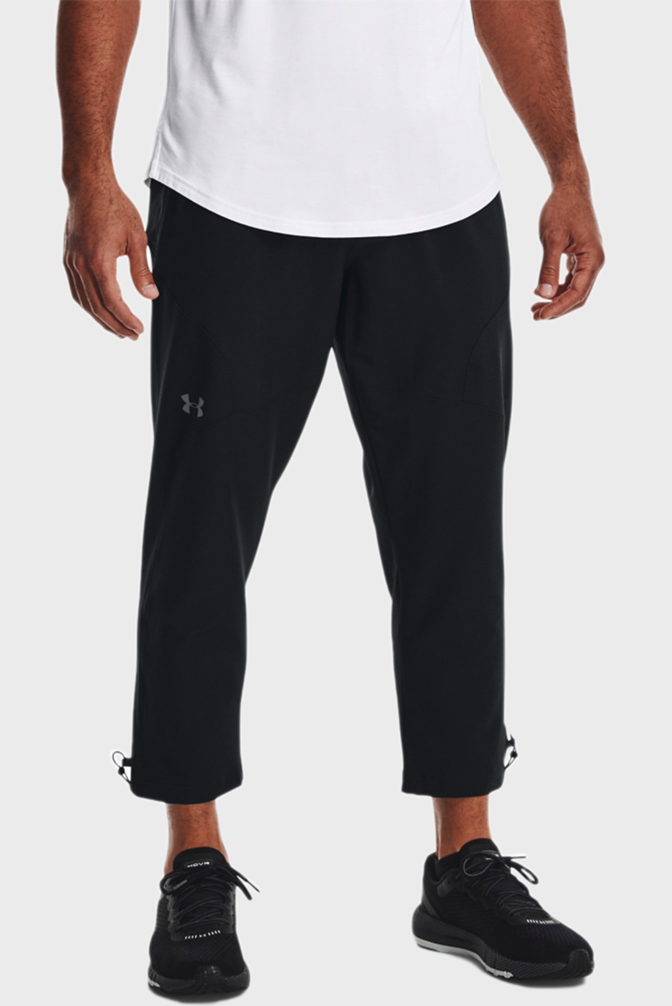 Чоловічі чорні спортивні штани UA Unstoppable Crop Pant 1