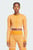 Жіночий помаранчевий лонгслів adidas by Stella McCartney TrueStrength Seamless