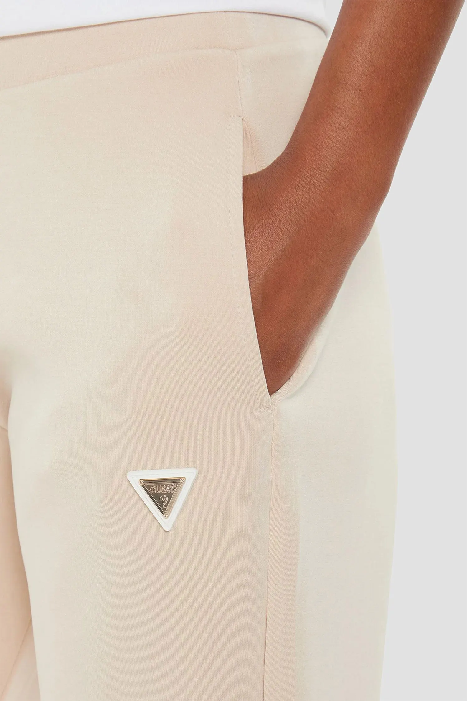 Жіночі бежеві спортивні штани 4