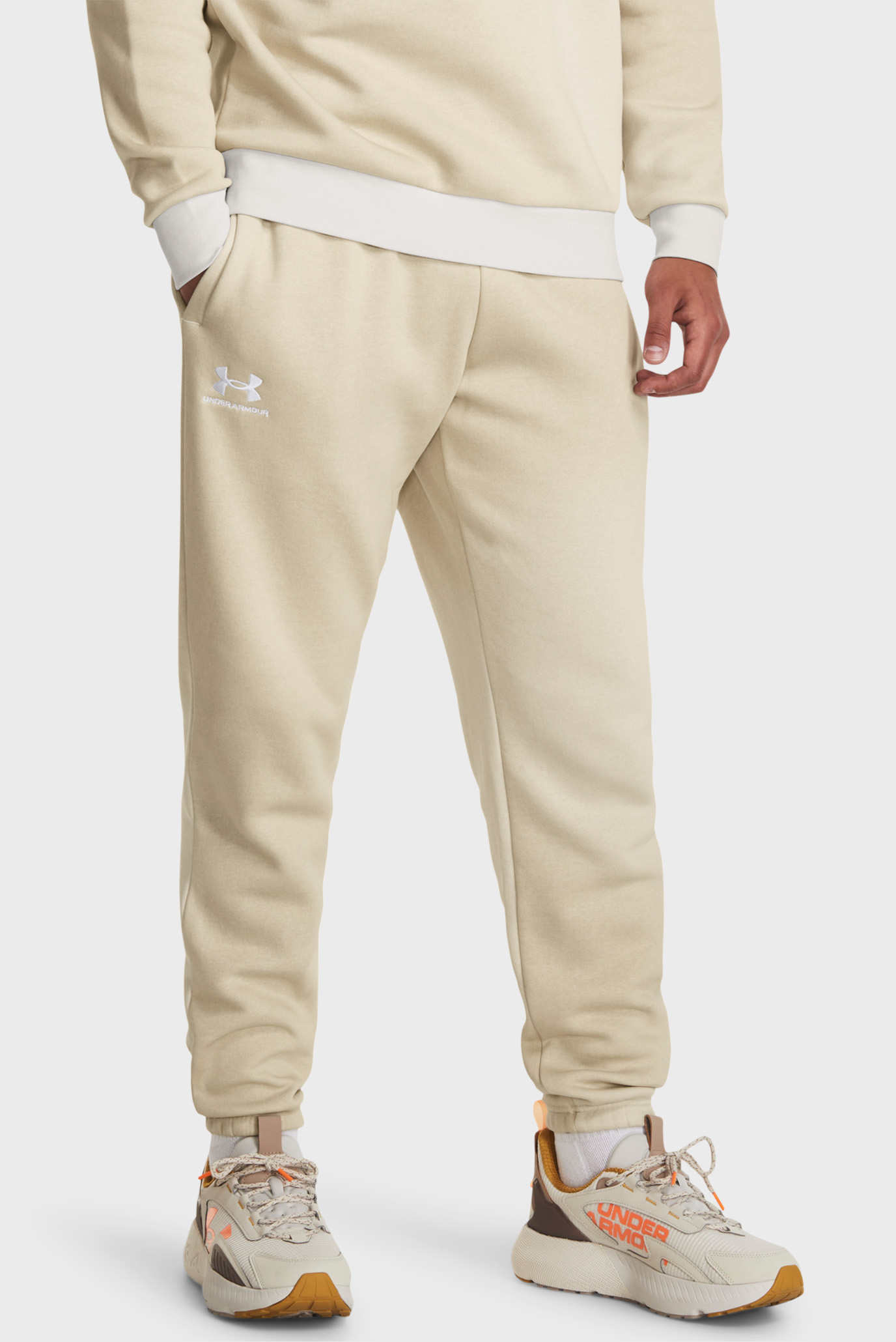 Чоловічі бежеві спортивні штани UA Essential Flc Novelty Jgr 1